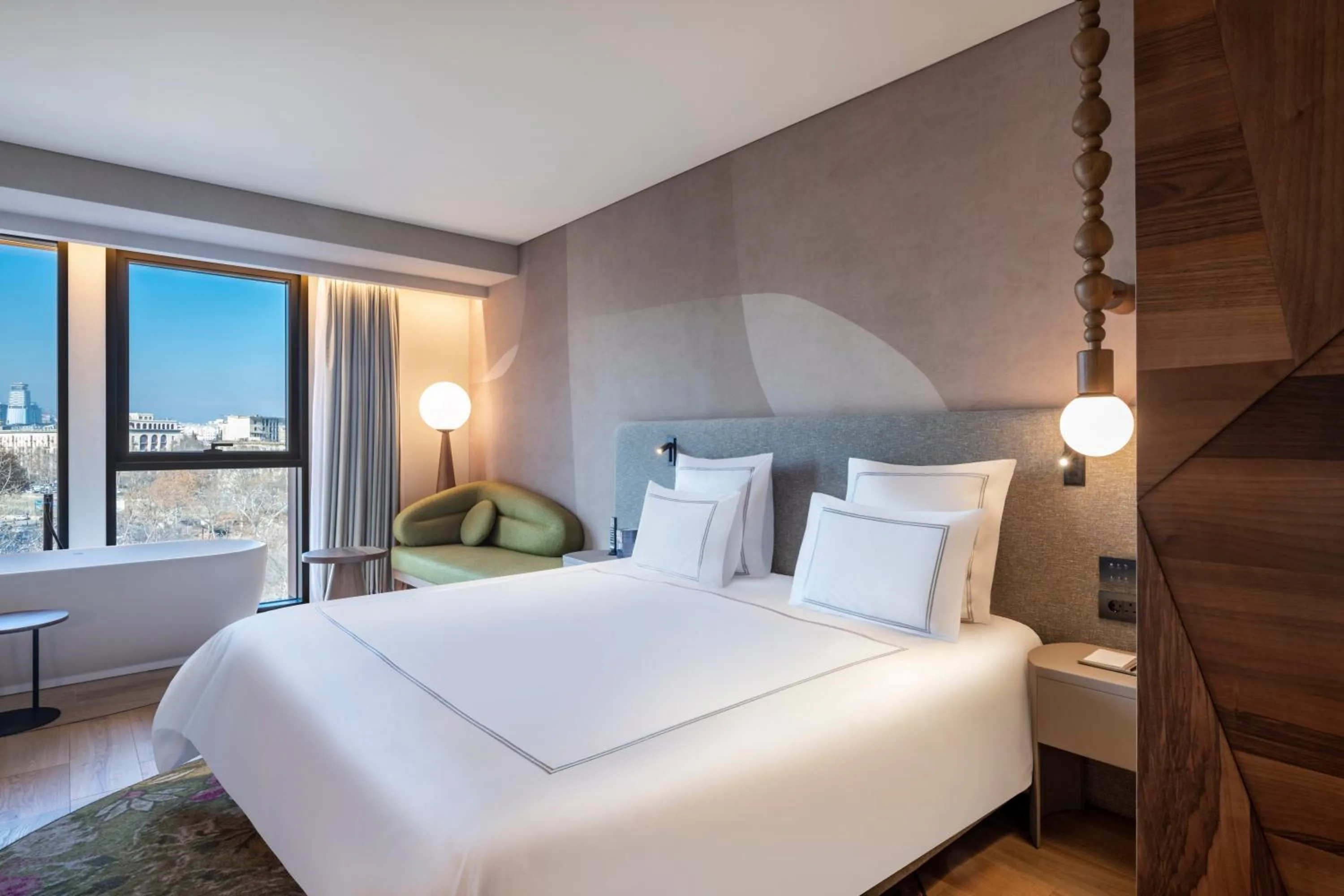 Bed in Swissôtel Tbilisi