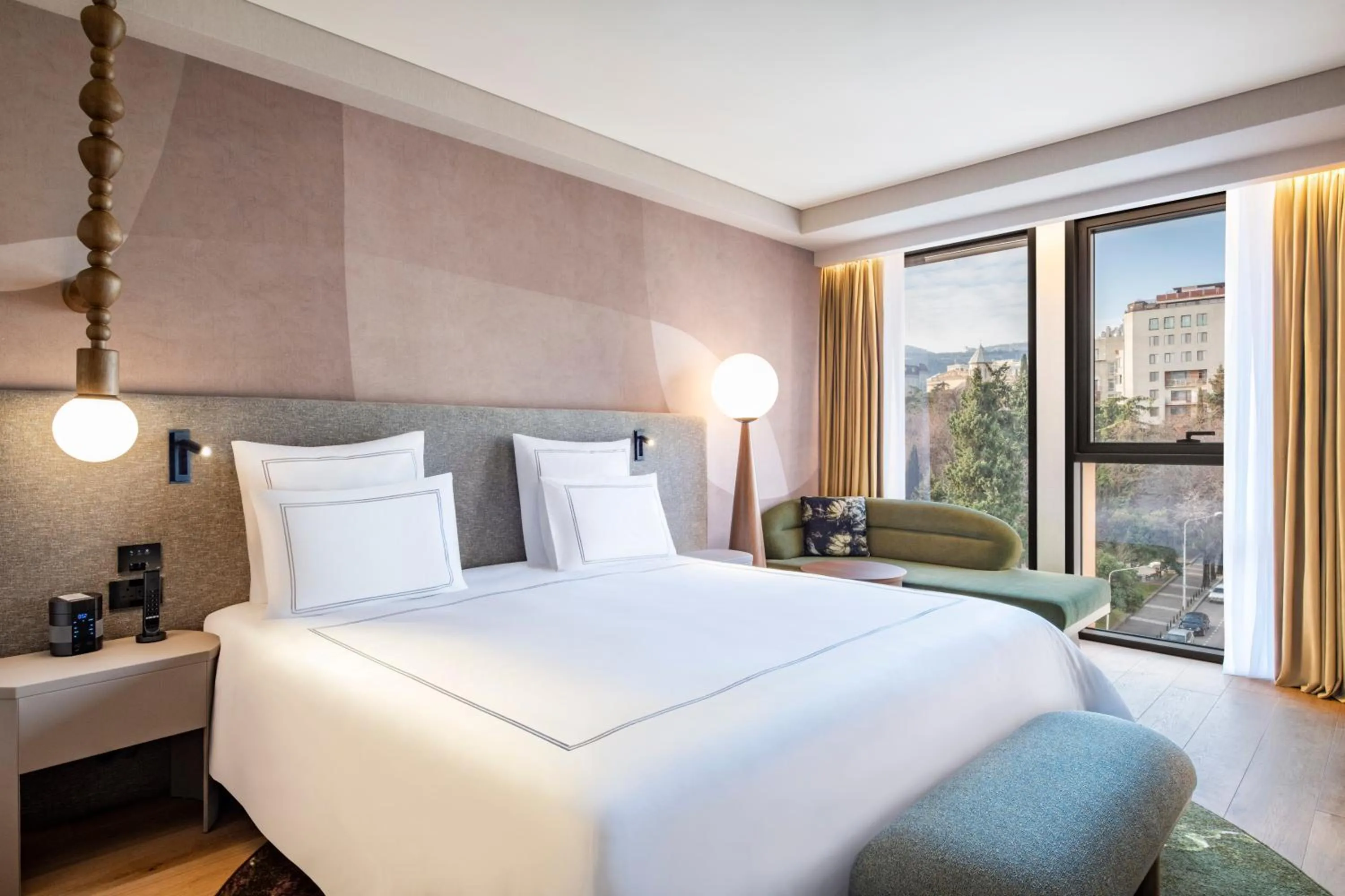 Bed in Swissôtel Tbilisi