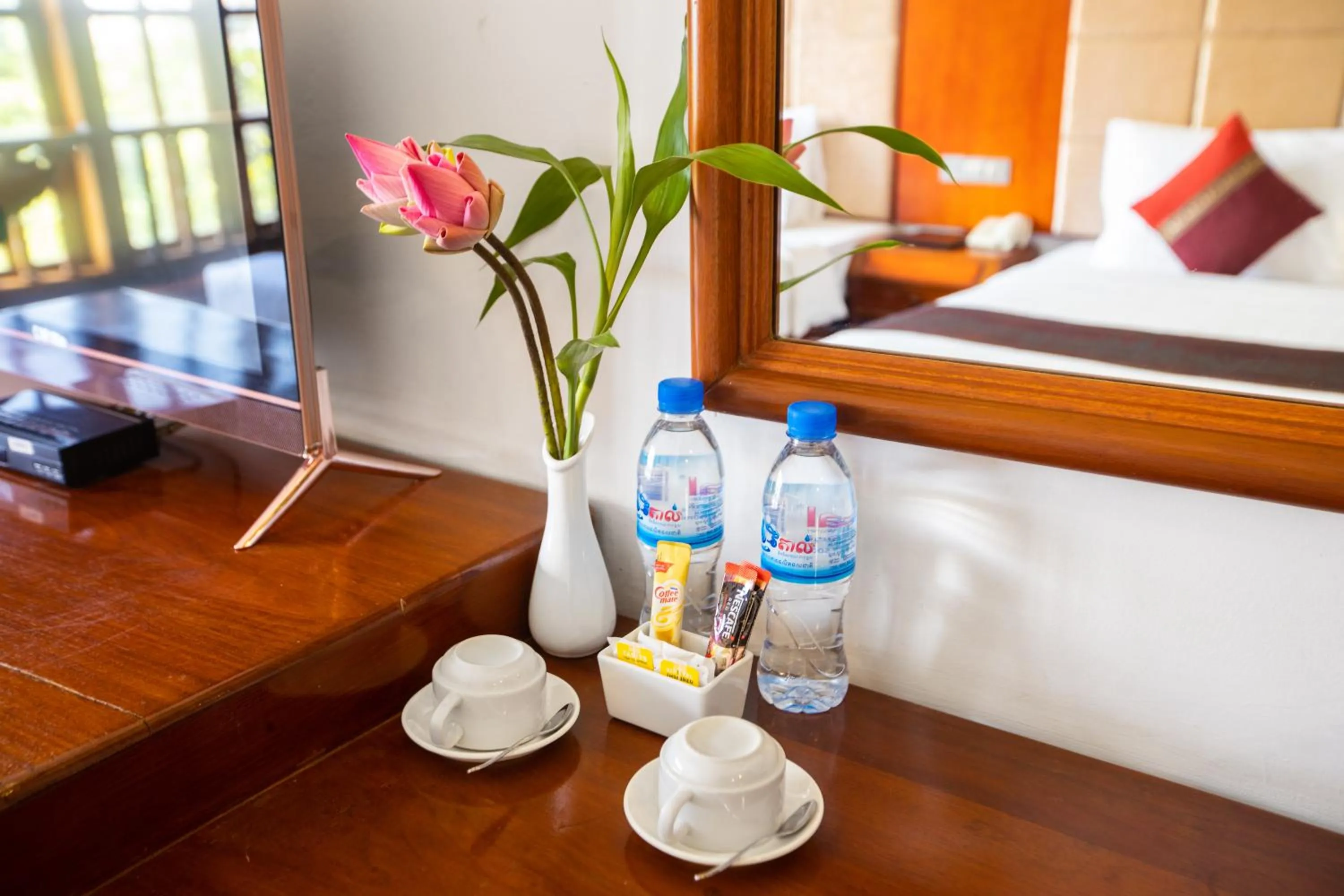 Drinks, Bed in Angkor Land Urban Boutique