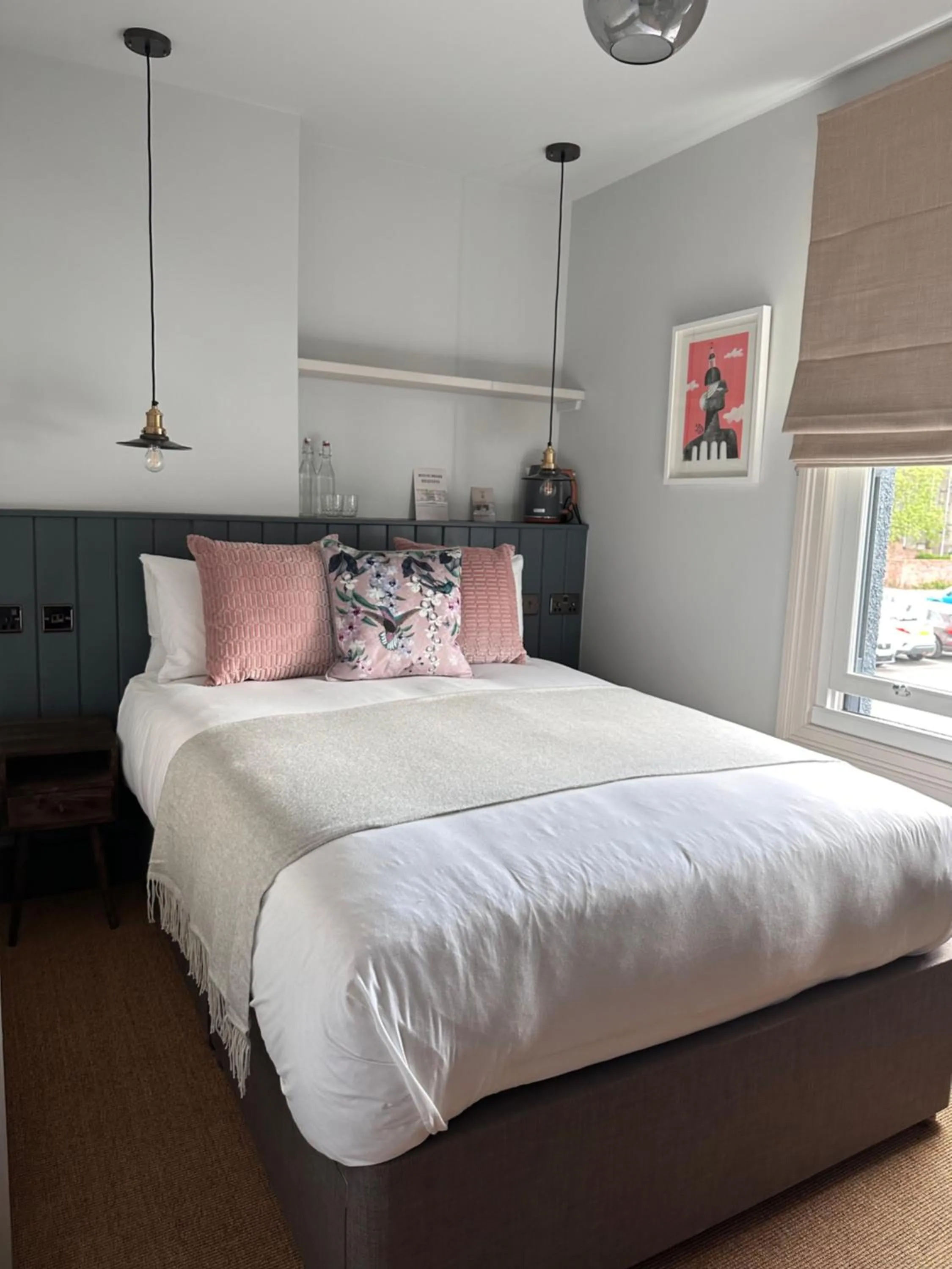 Bed in Rooms Above Sugar Boat