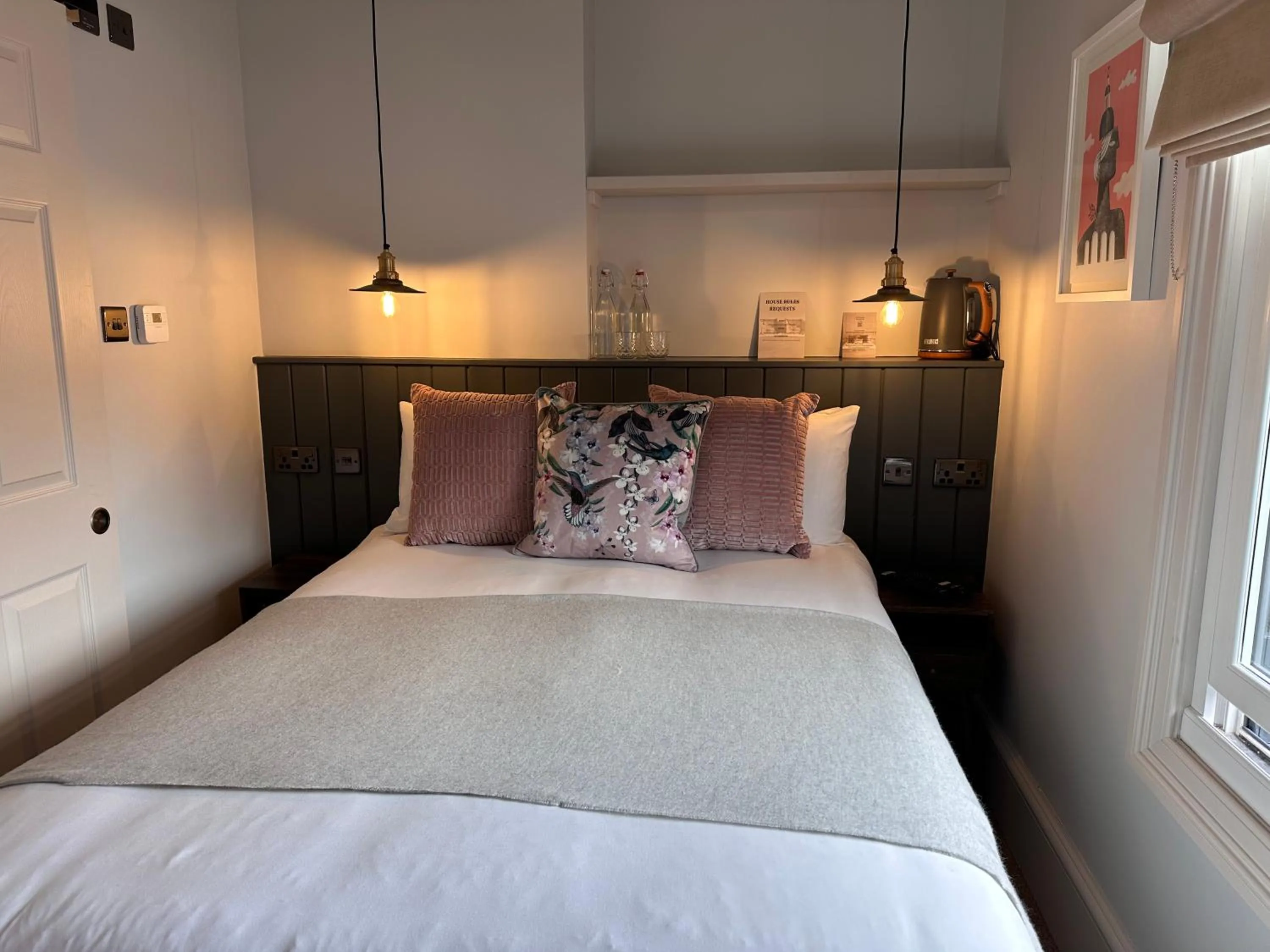 Bed in Rooms Above Sugar Boat