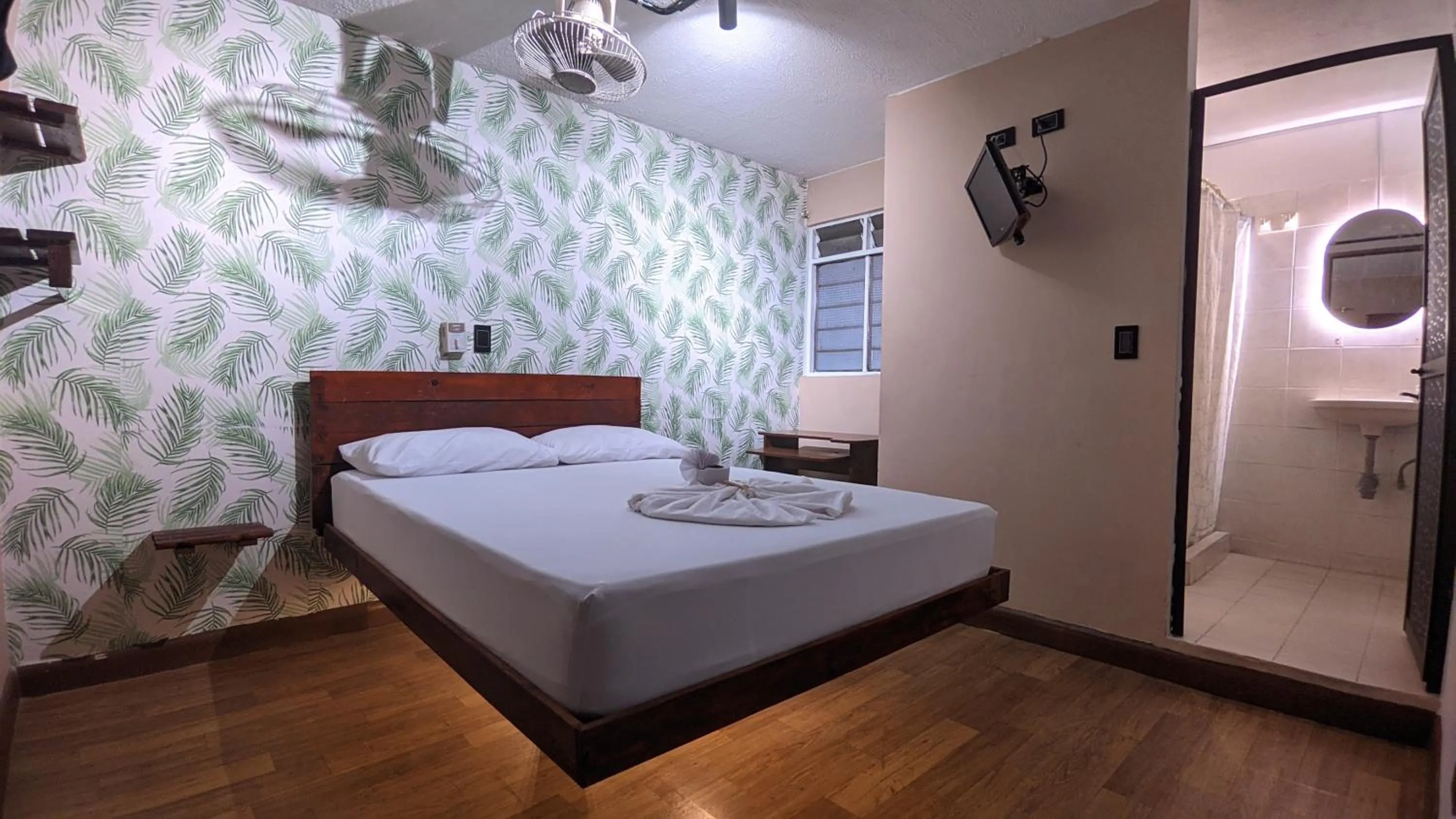 Bed in Hotel Grand ilama