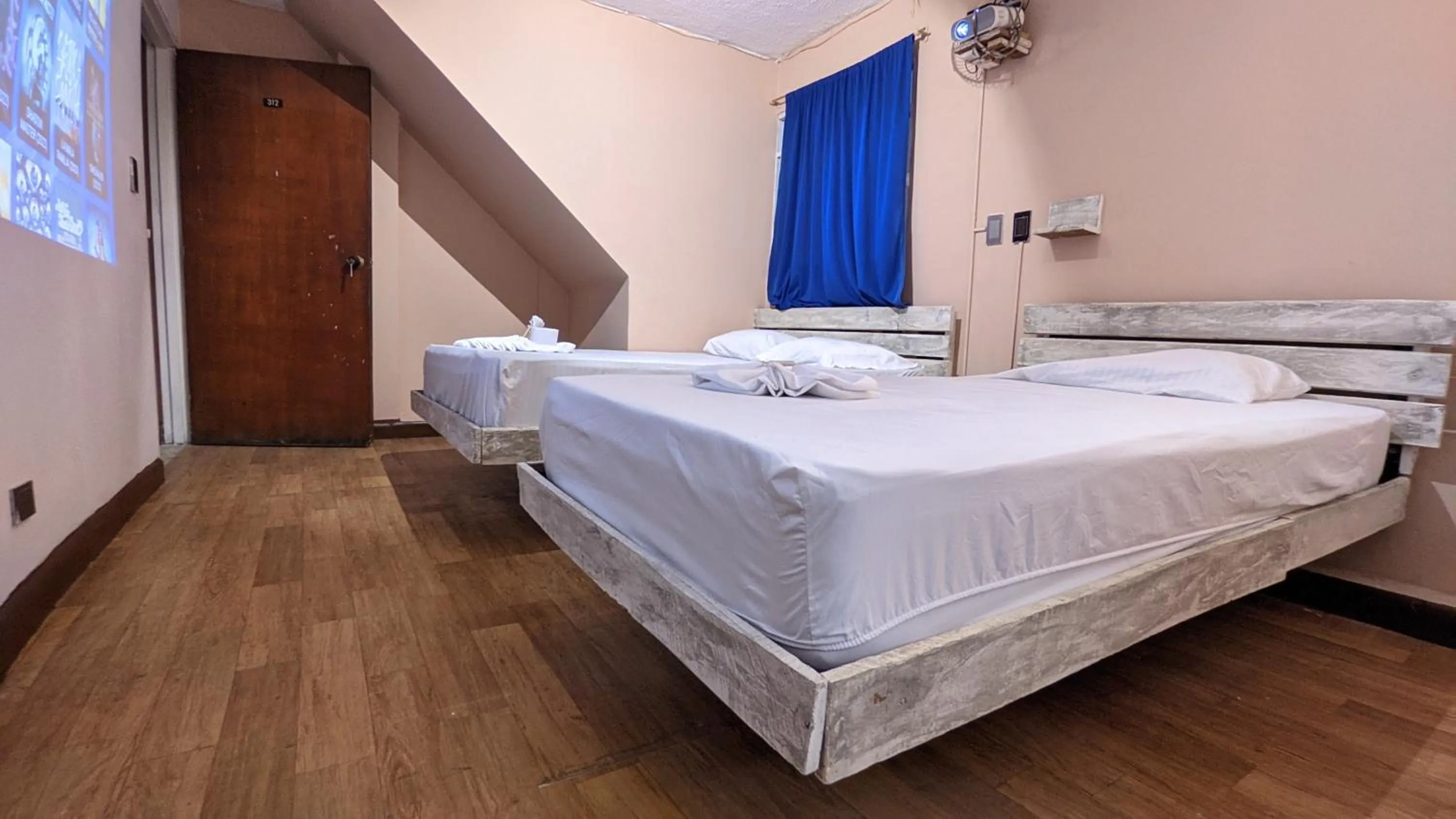 Bed in Hotel Grand ilama