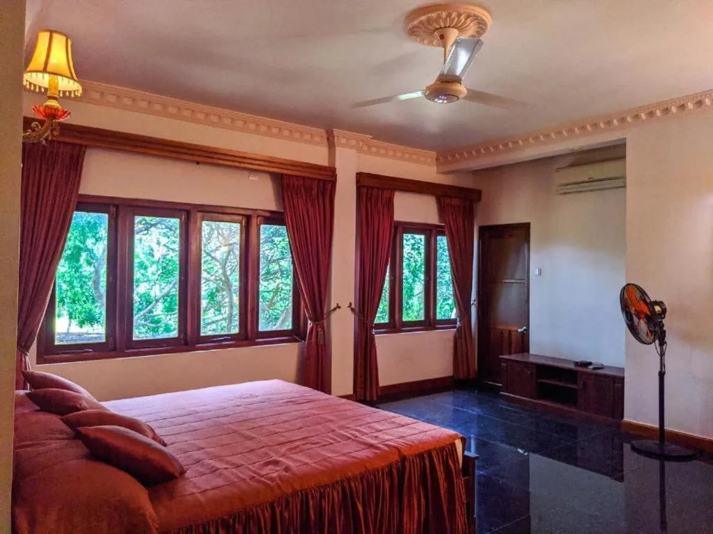 Bed in Vintara Eco Resort