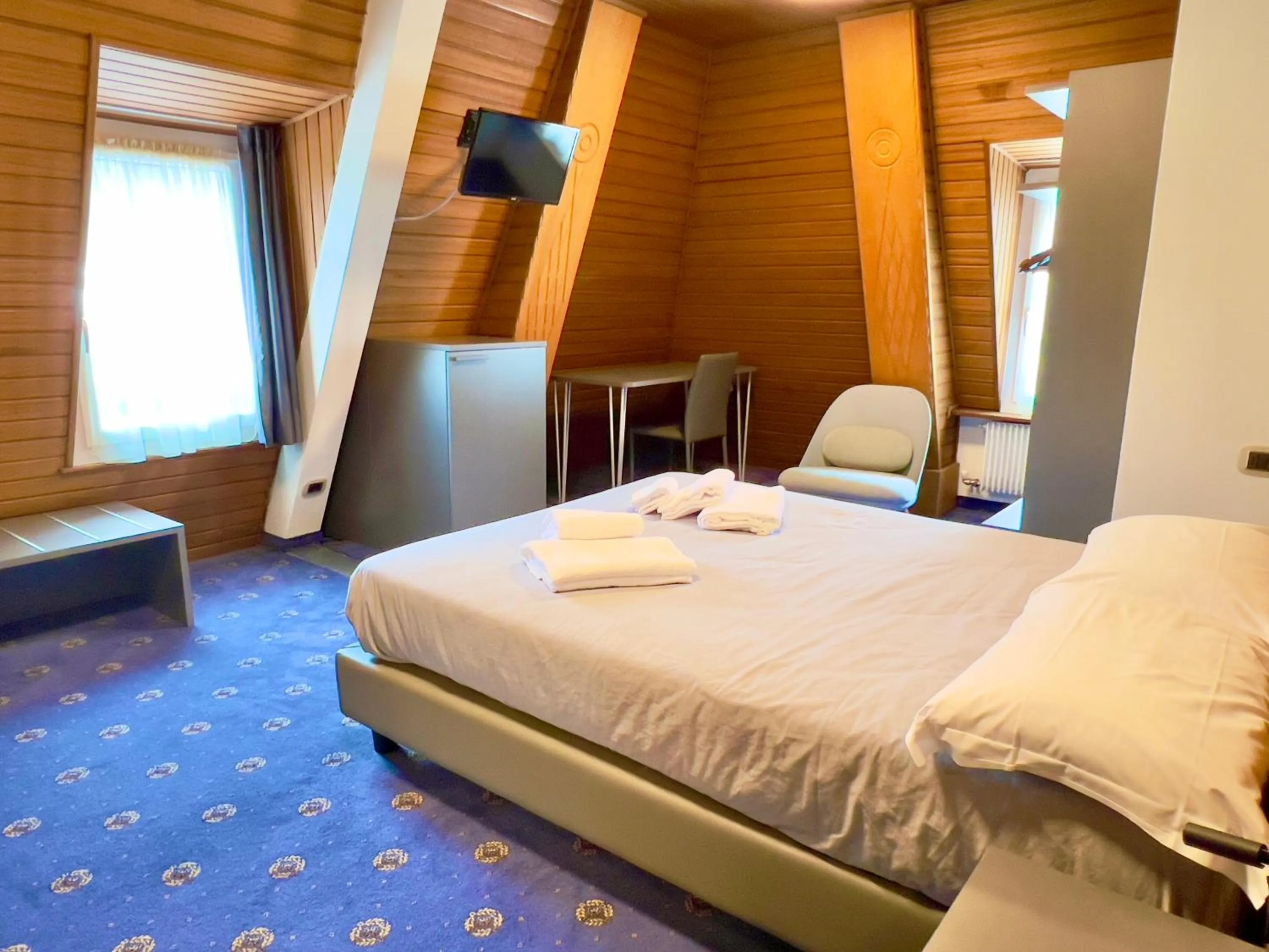 Bed in Hotel Regina del Bosco