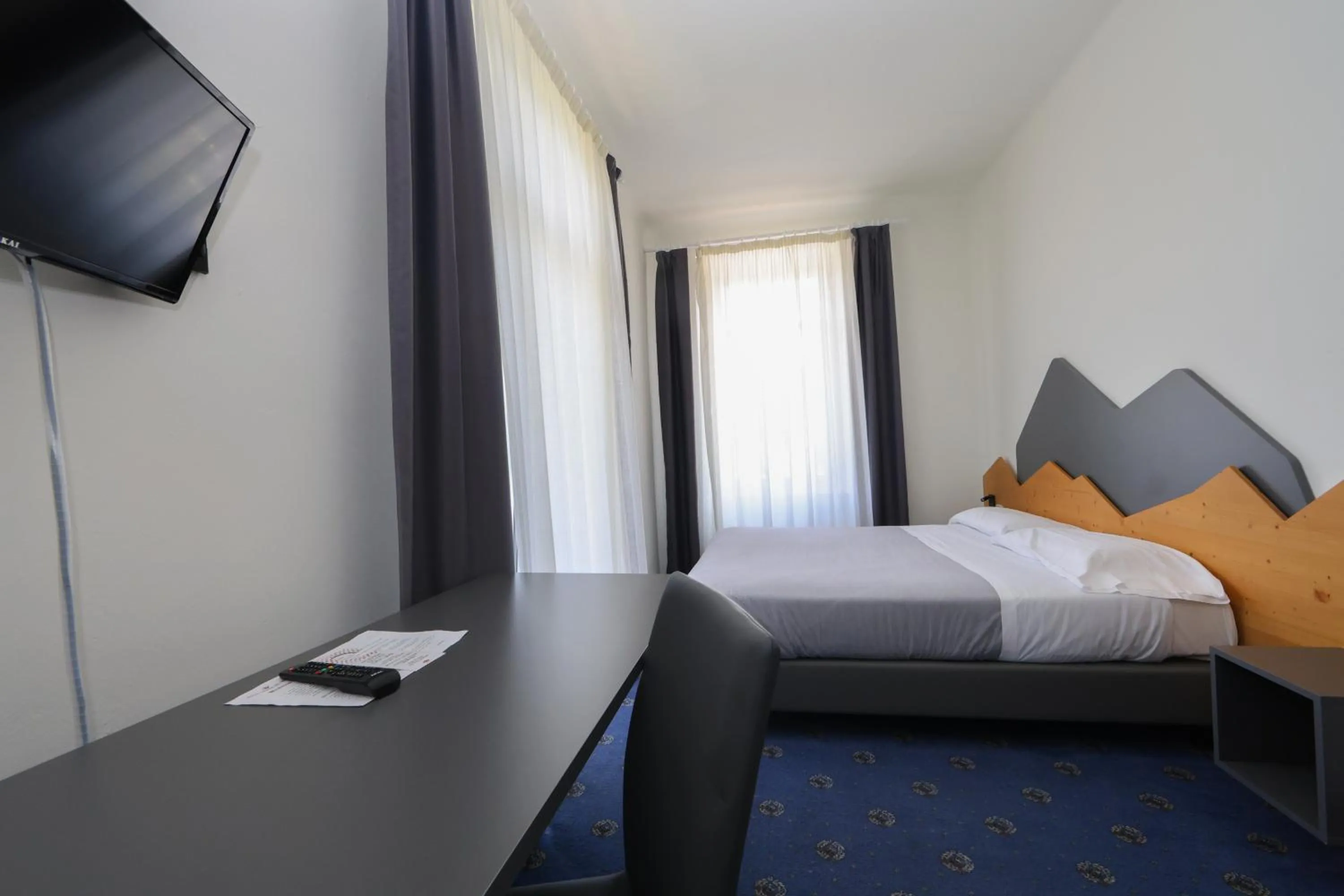 Bed in Hotel Regina del Bosco