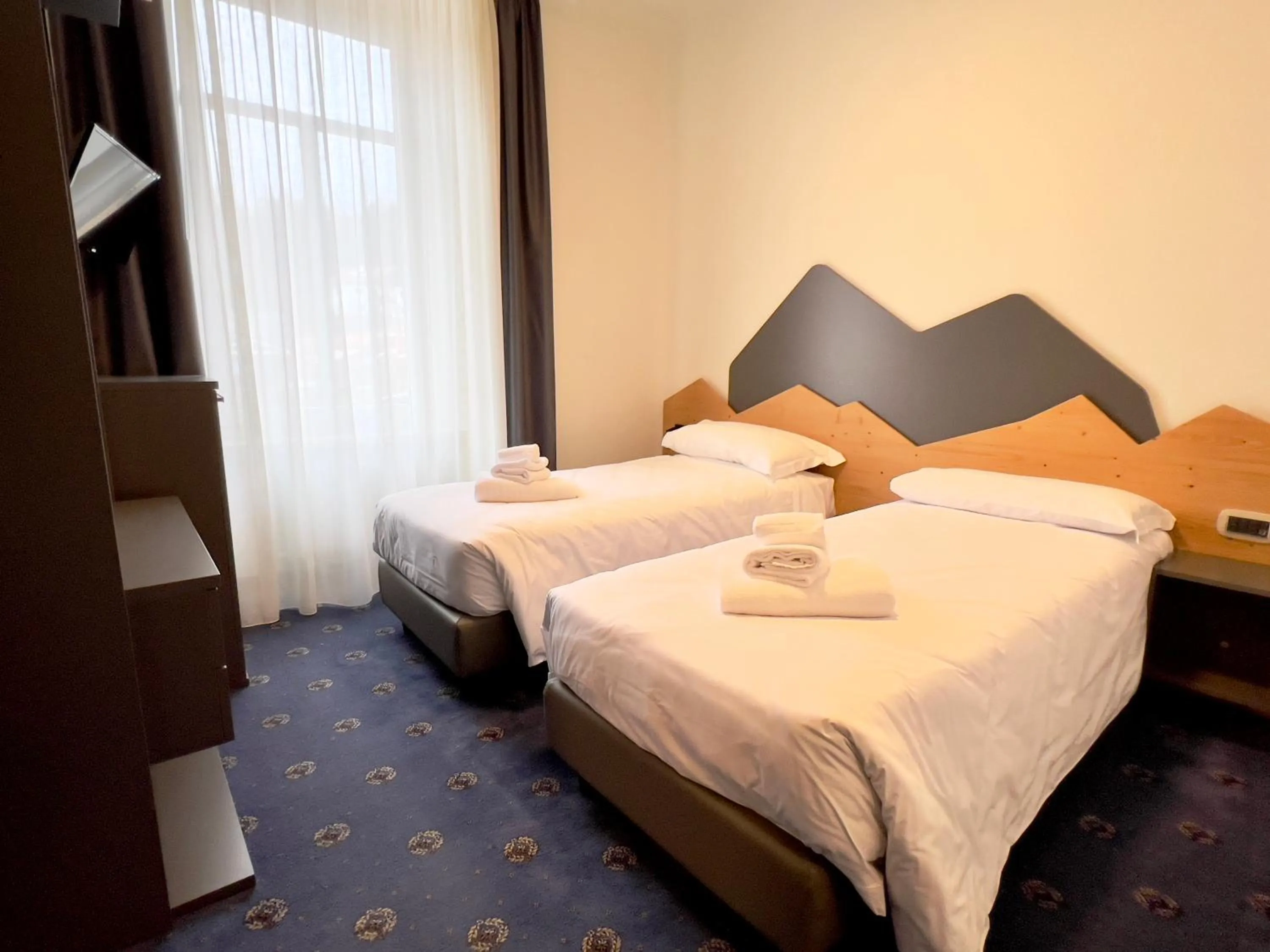 Bed in Hotel Regina del Bosco