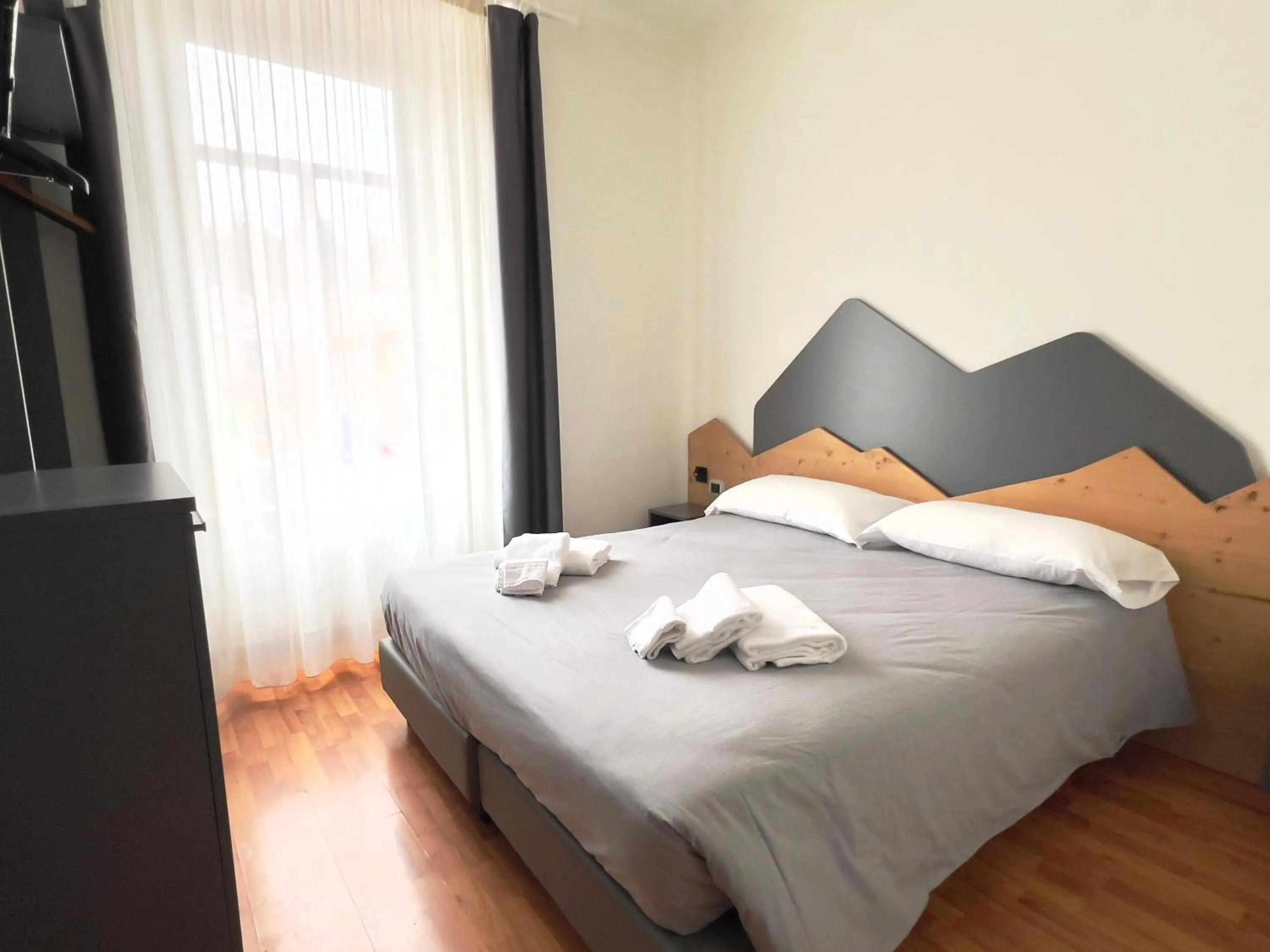 Bed in Hotel Regina del Bosco