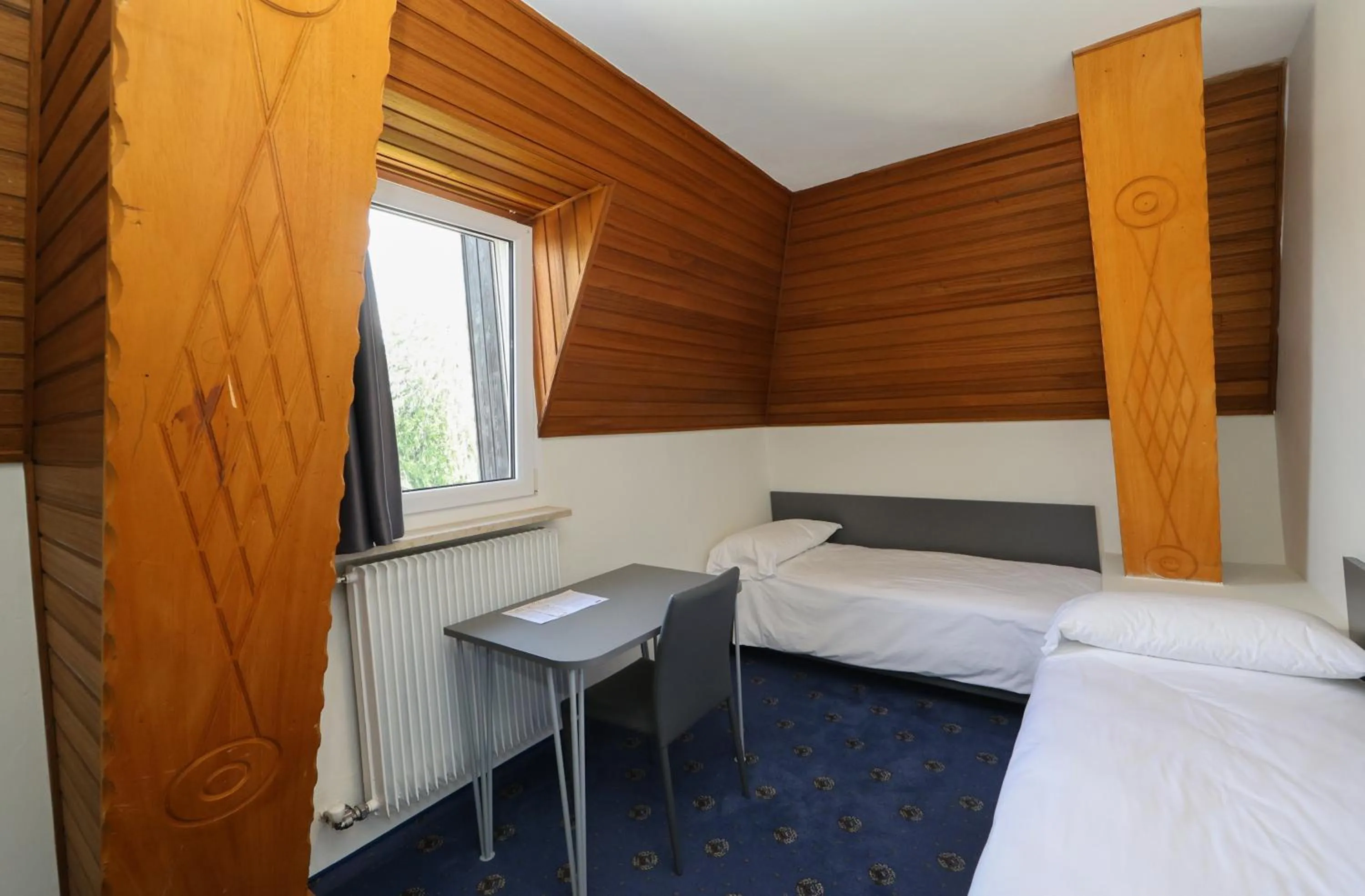 Bed in Hotel Regina del Bosco