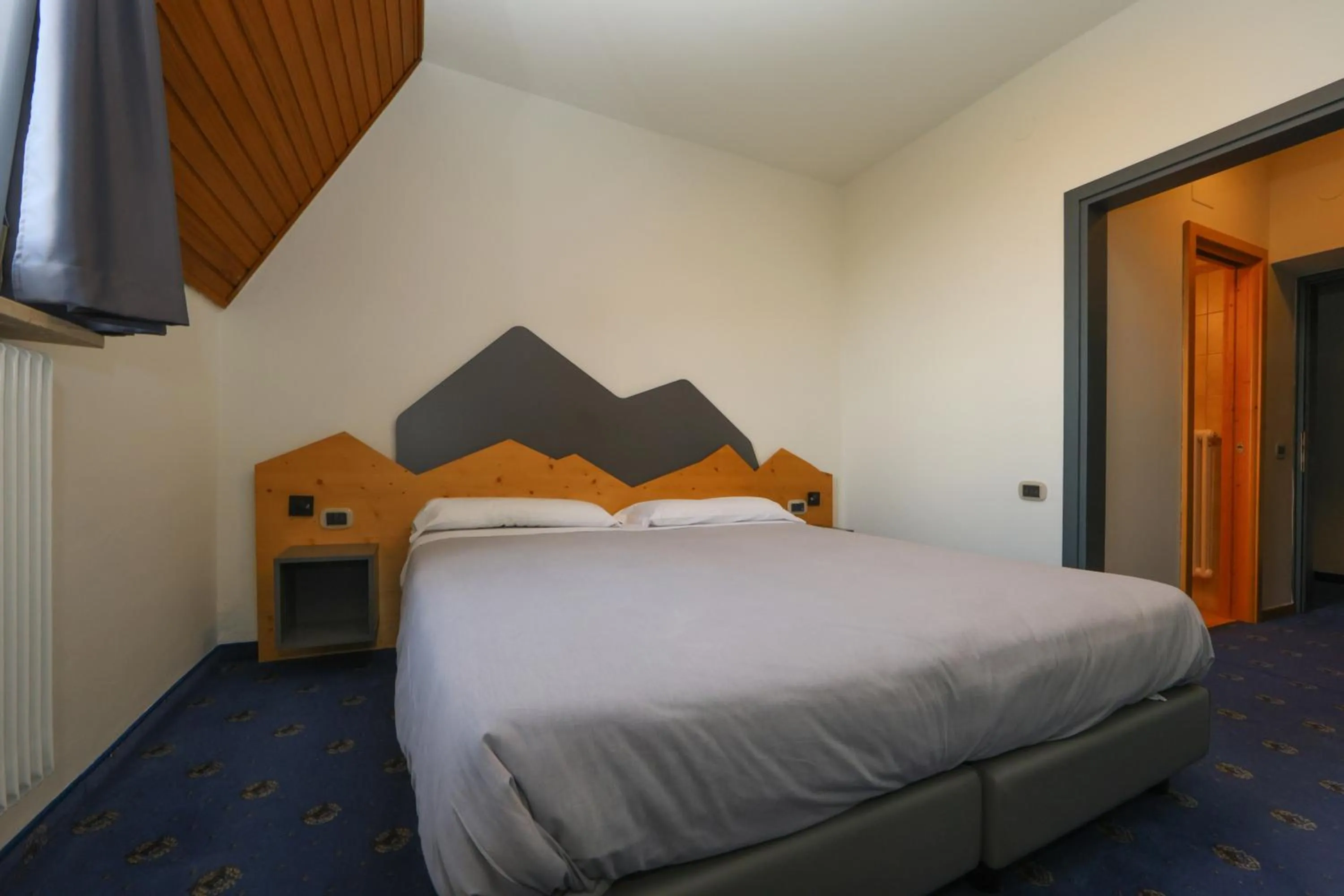 Photo of the whole room, Bed in Hotel Regina del Bosco