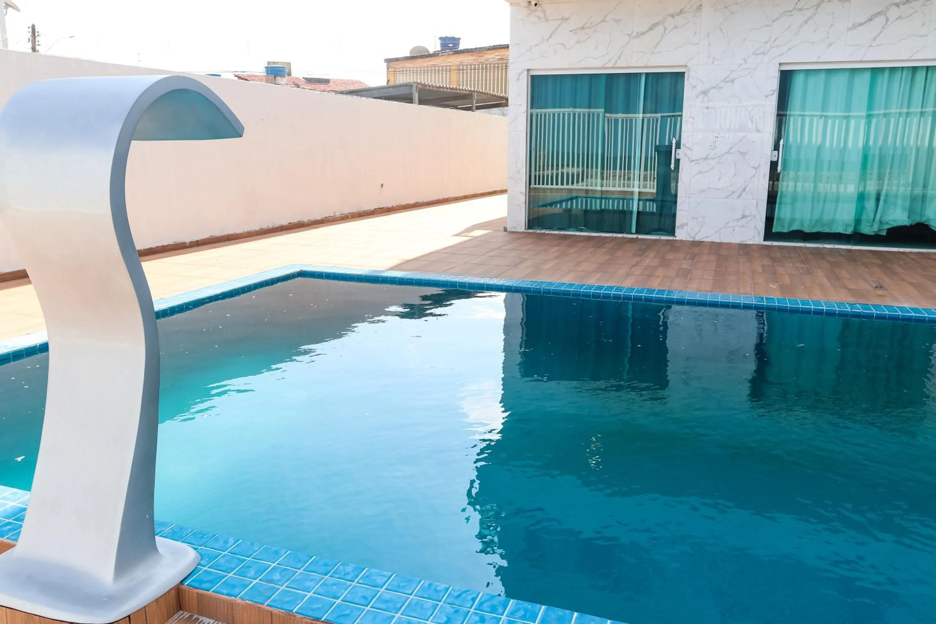 Swimming pool in Pousada Diana Maragogi