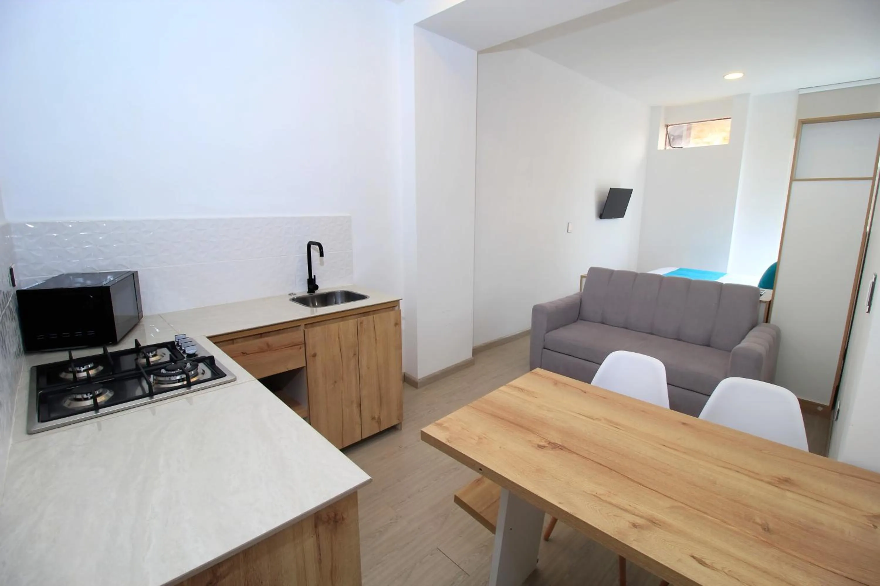 Kitchen or kitchenette in Apart Hotel Casa Blanca