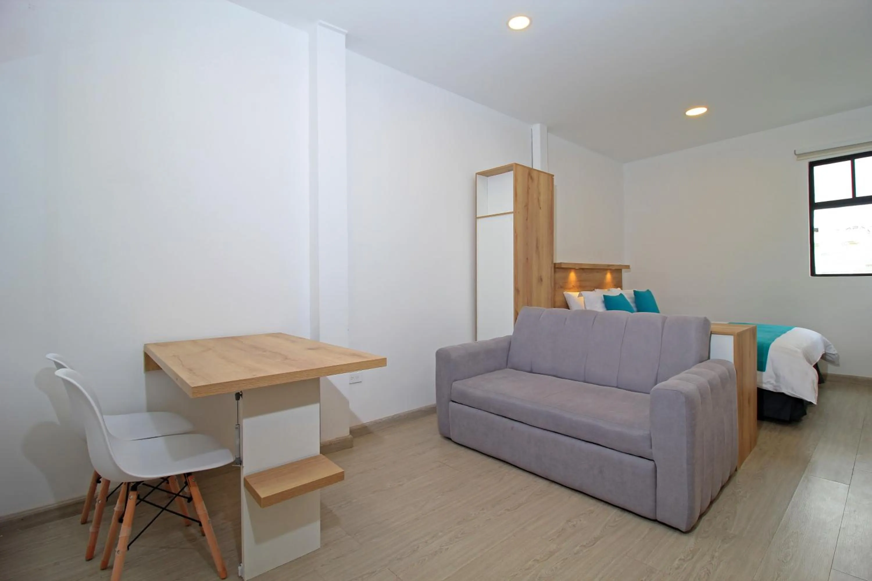 Bed in Apart Hotel Casa Blanca