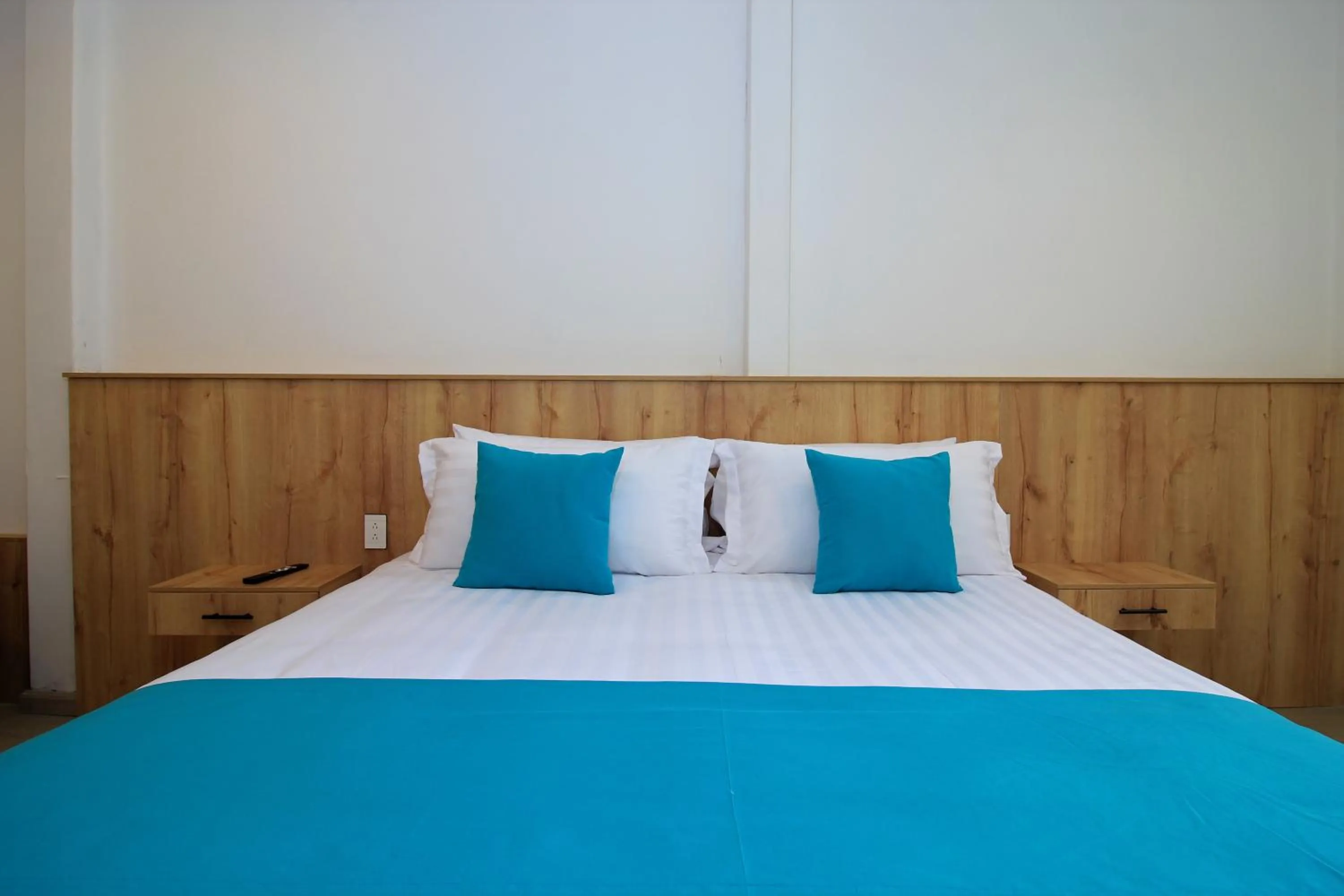 Bed in Apart Hotel Casa Blanca