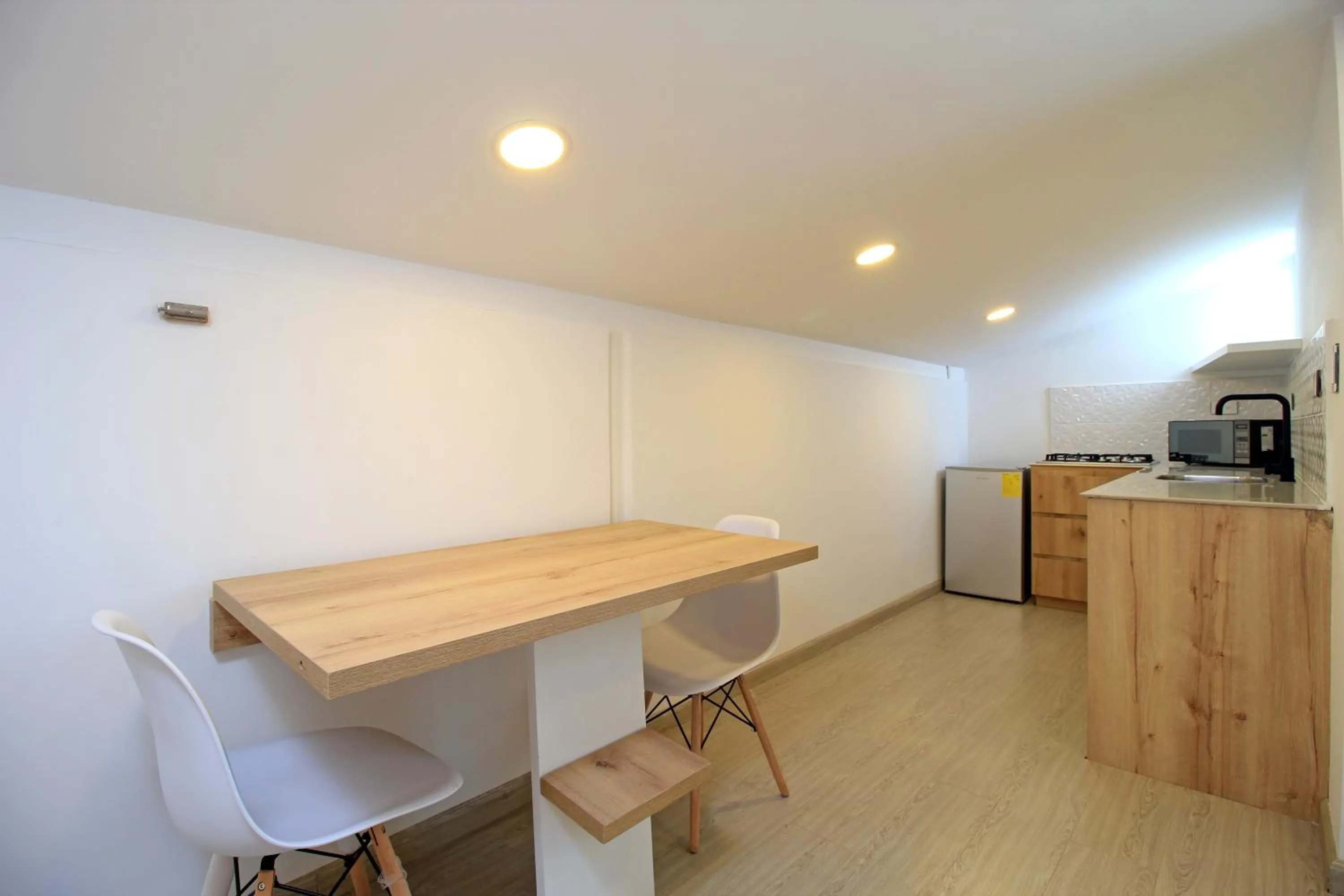 Kitchen or kitchenette in Apart Hotel Casa Blanca