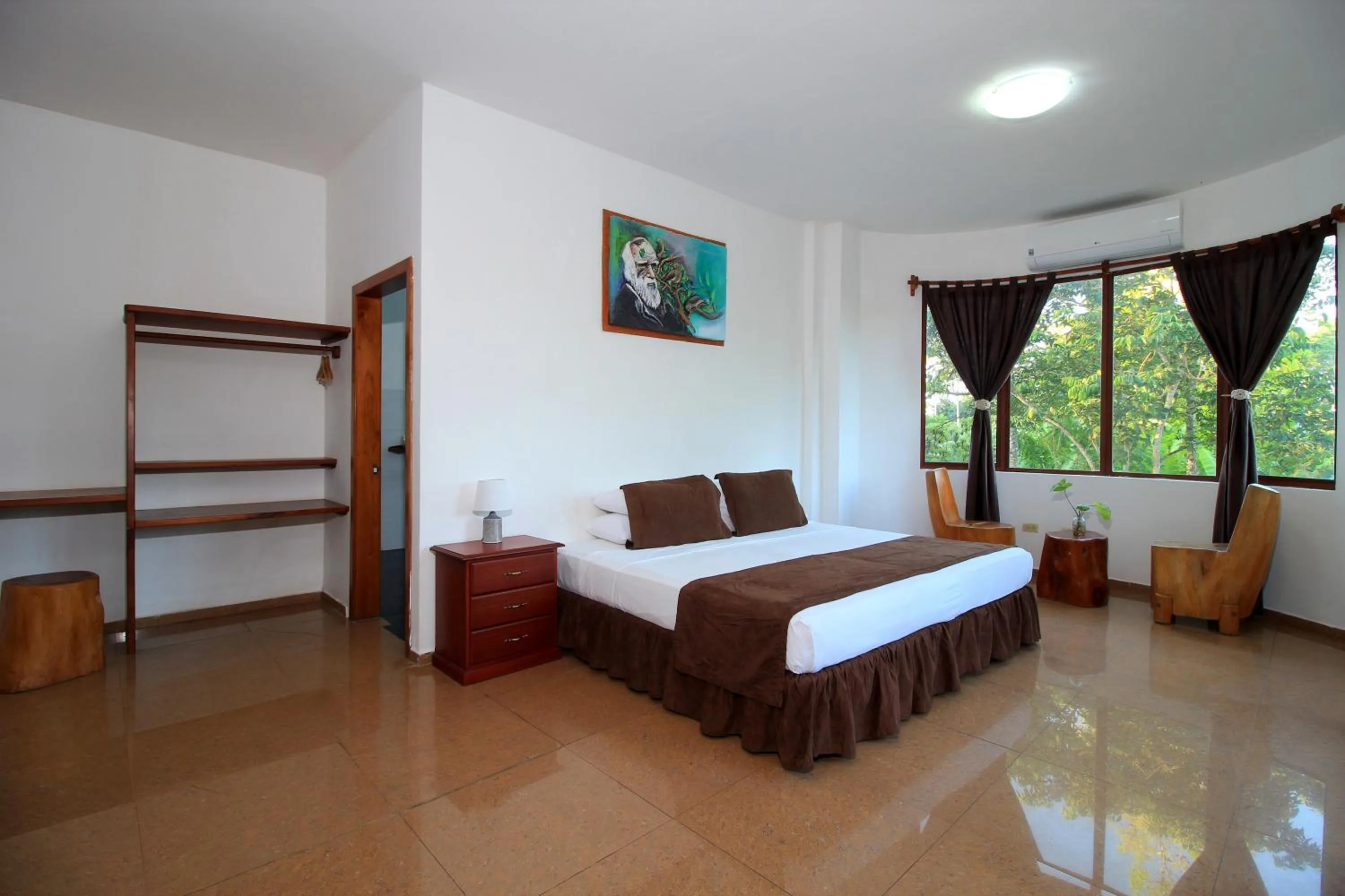 Photo of the whole room, Bed in Natura Gardens Galápagos