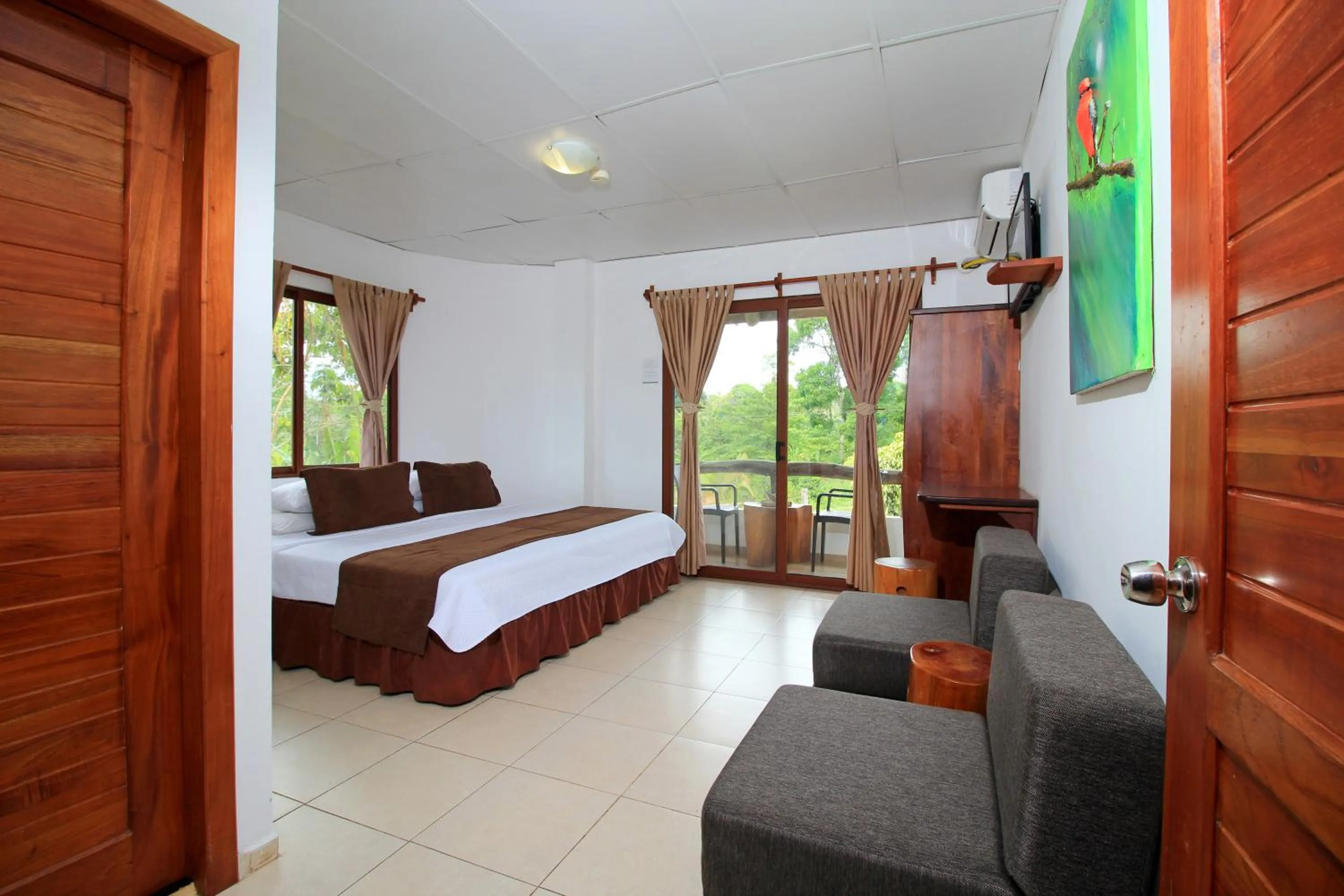 Photo of the whole room, Bed in Natura Gardens Galápagos