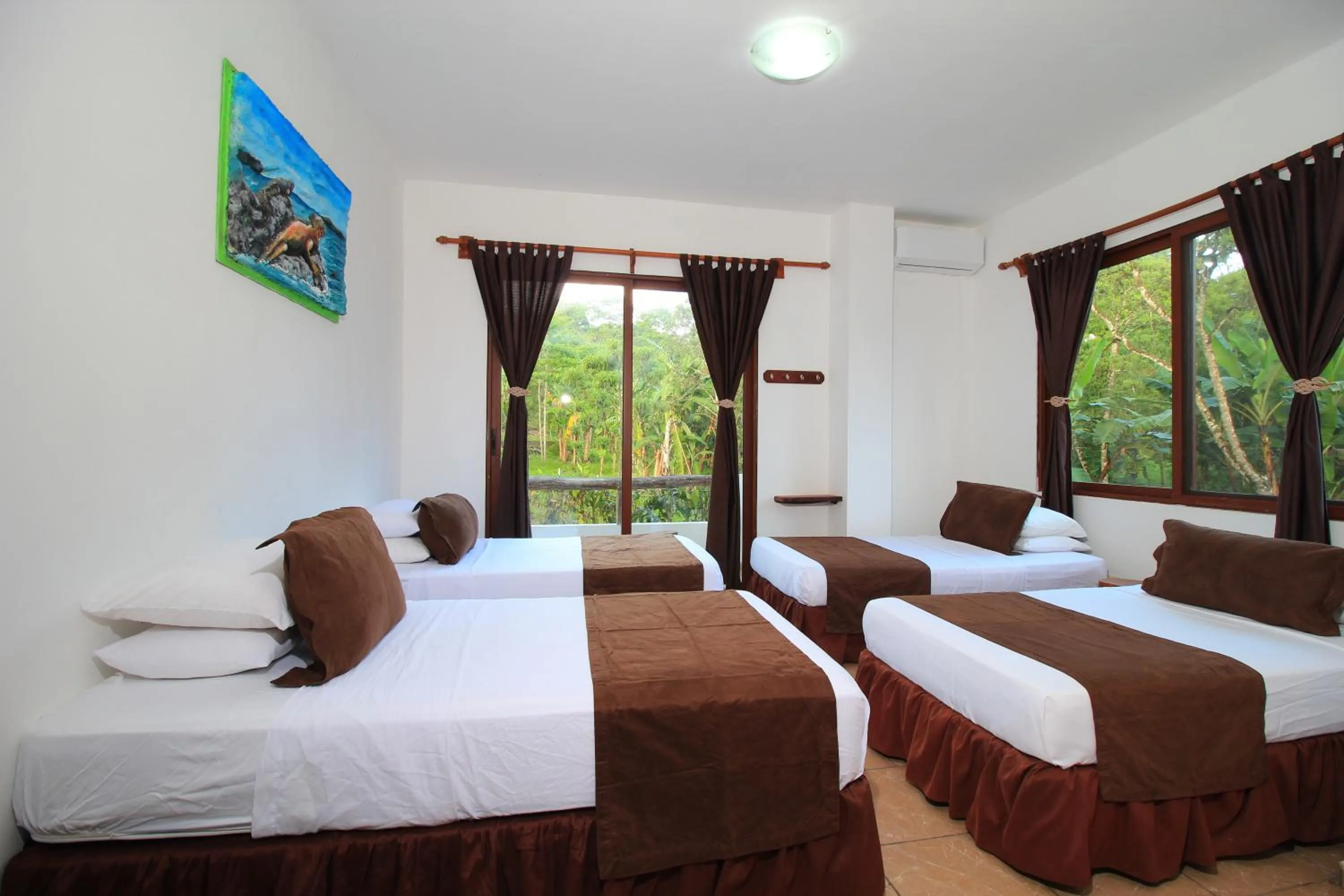 Photo of the whole room, Bed in Natura Gardens Galápagos