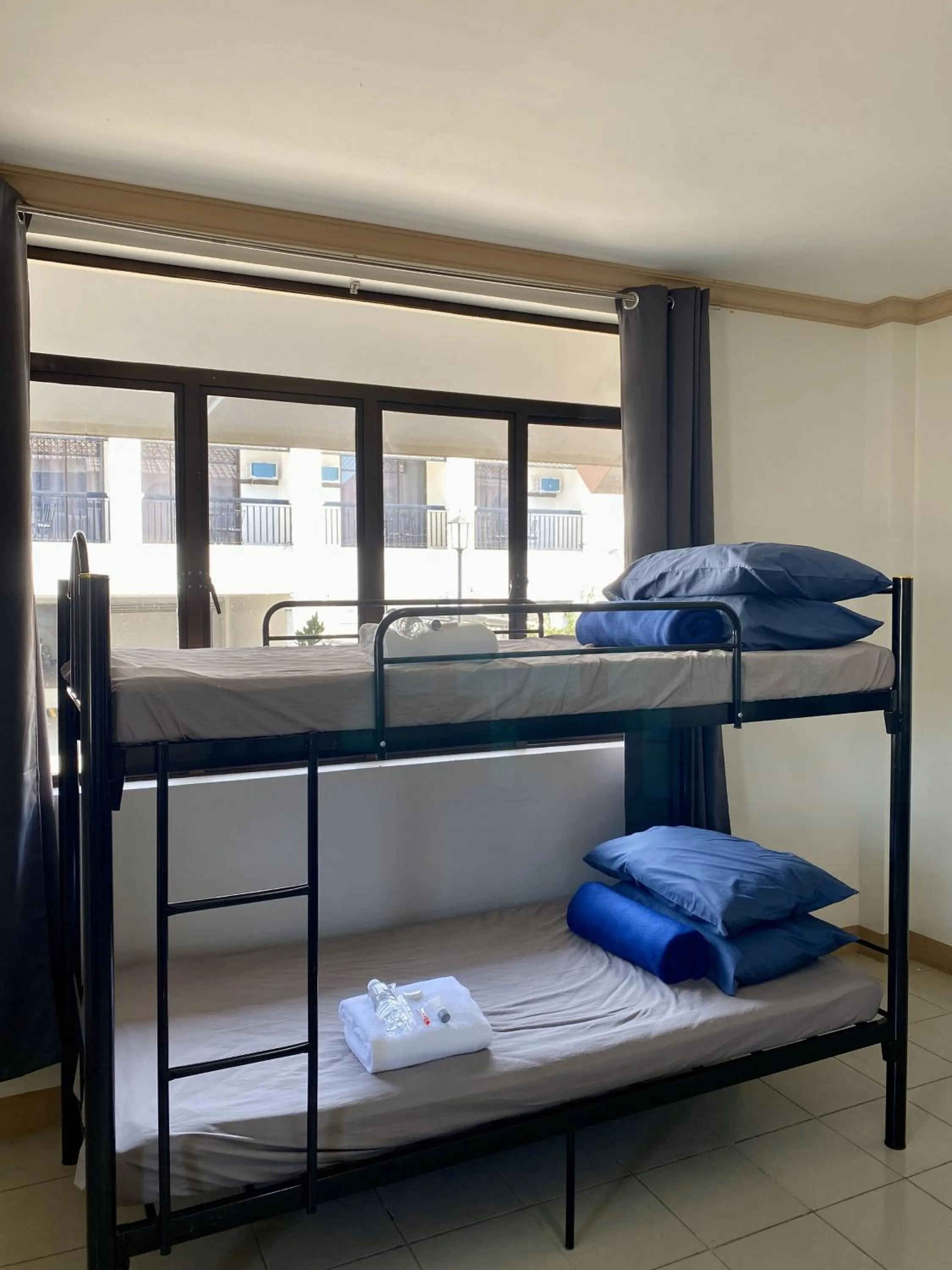 bunk bed, Bed in Plaza Del Norte Hotel and Convention Center