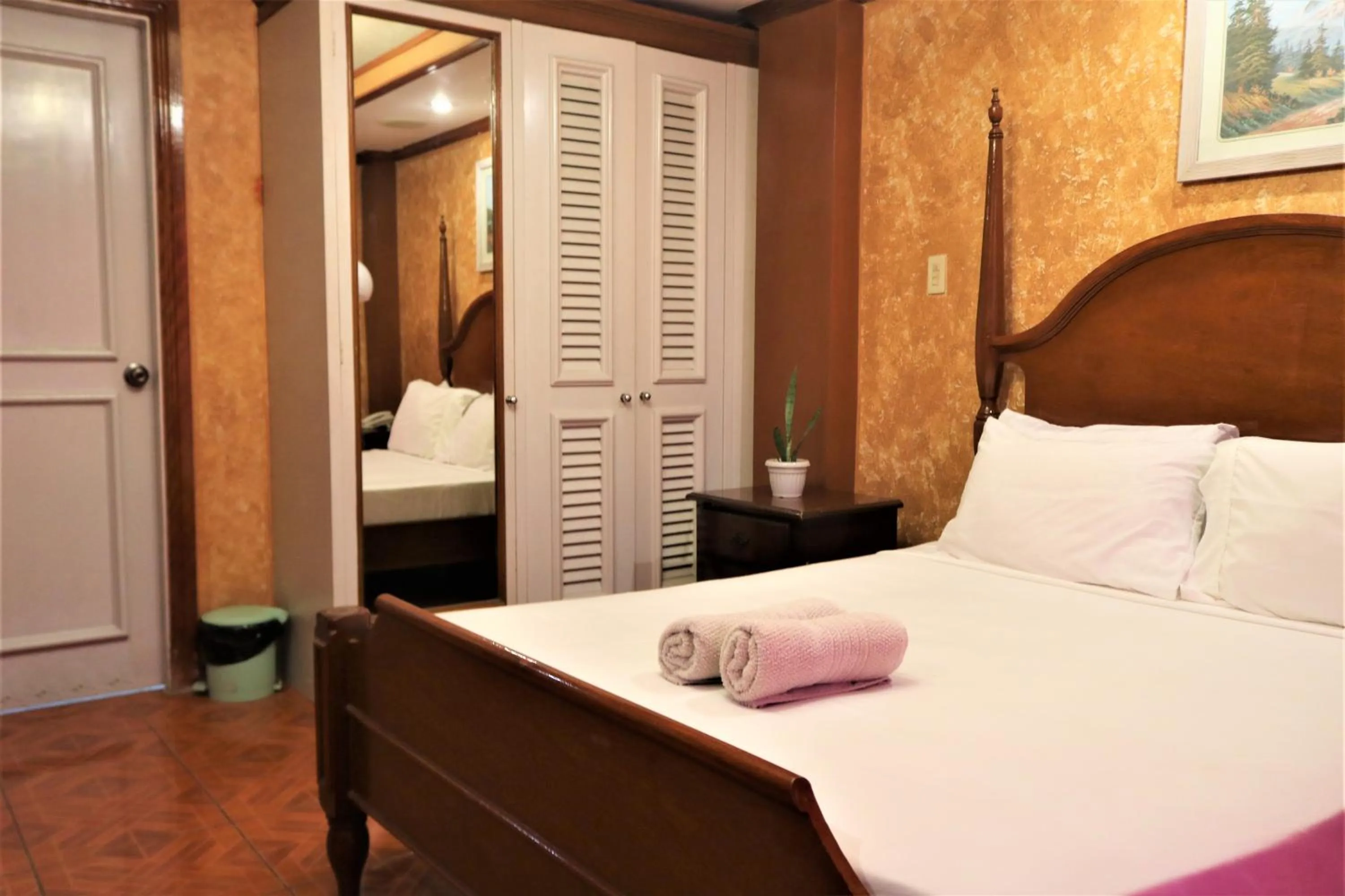 Bed in PALM TREE RESORT AND RESTAURANT