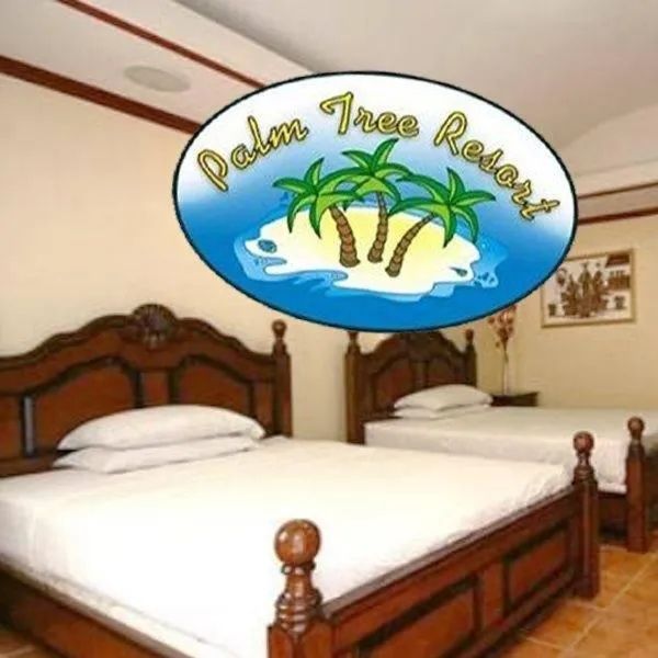 Bed in PALM TREE RESORT AND RESTAURANT