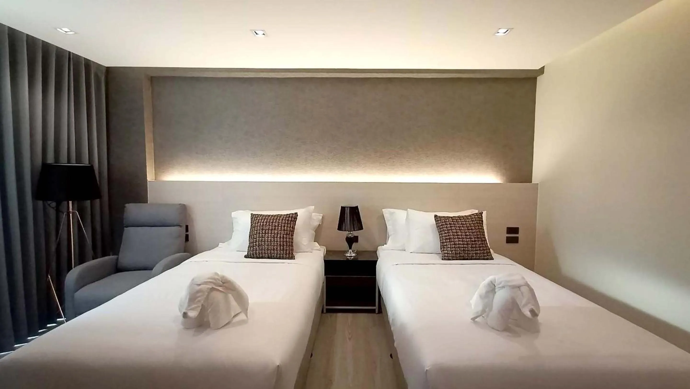 Bed in The 9 Residence Hotel