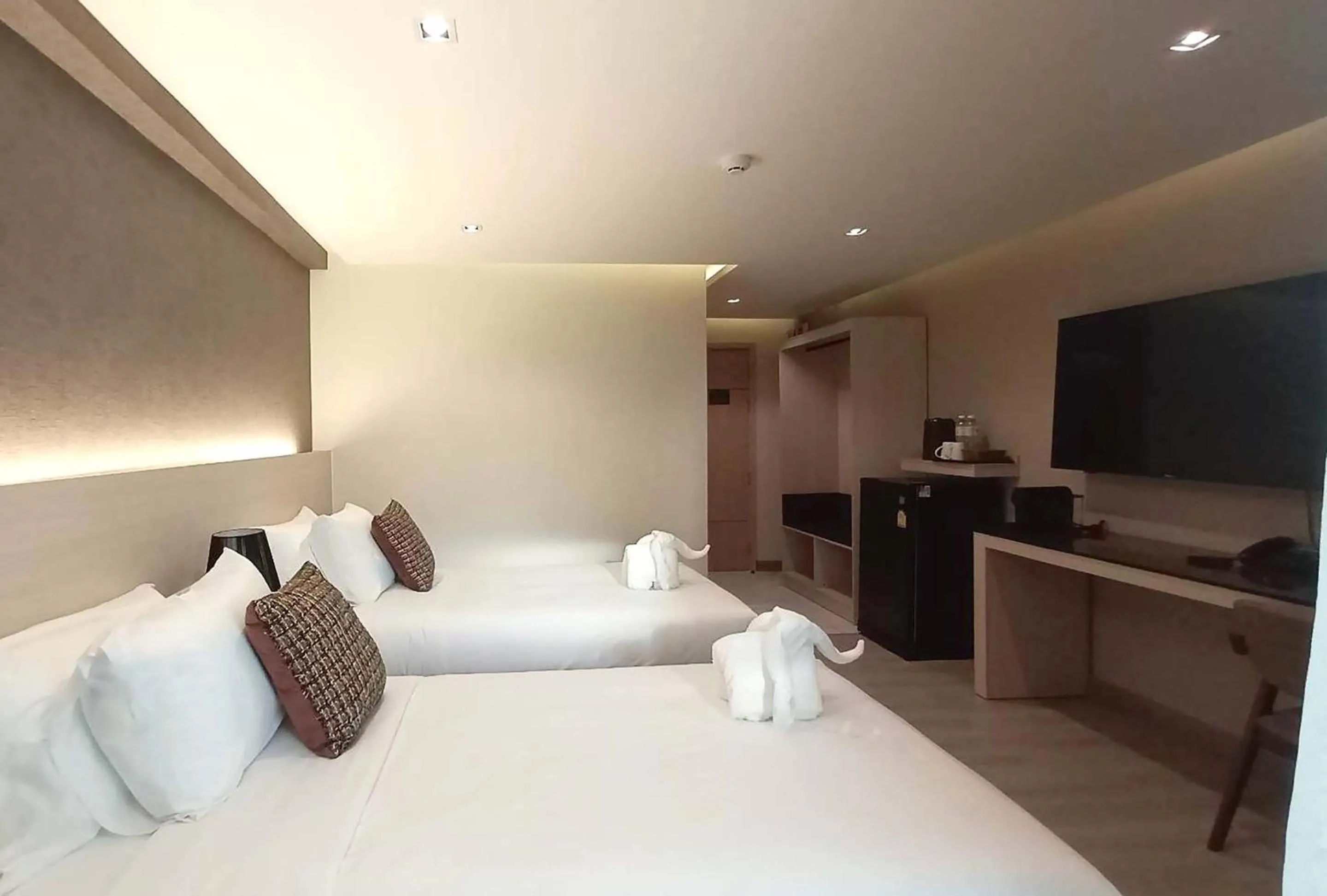Bed in The 9 Residence Hotel