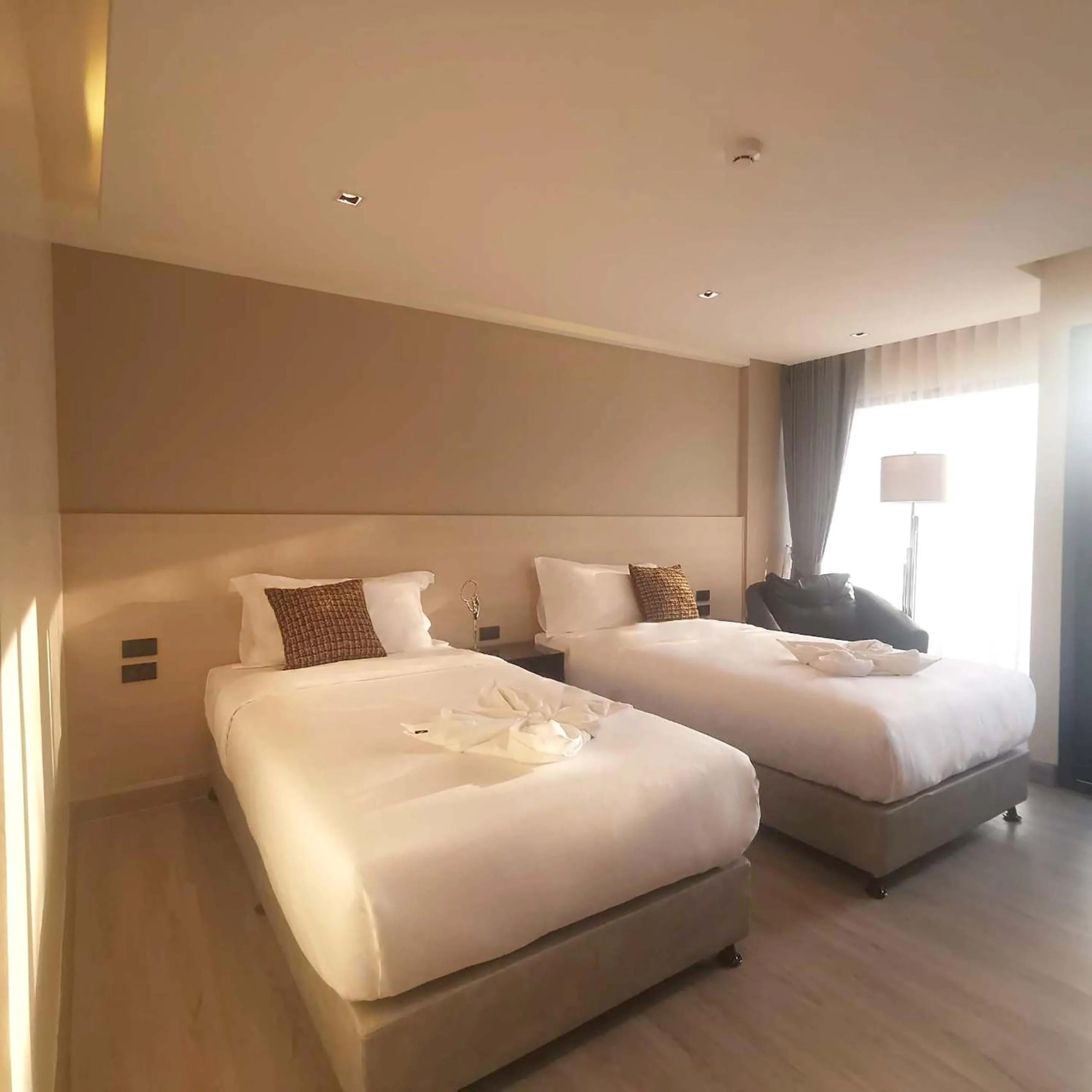 Bed in The 9 Residence Hotel