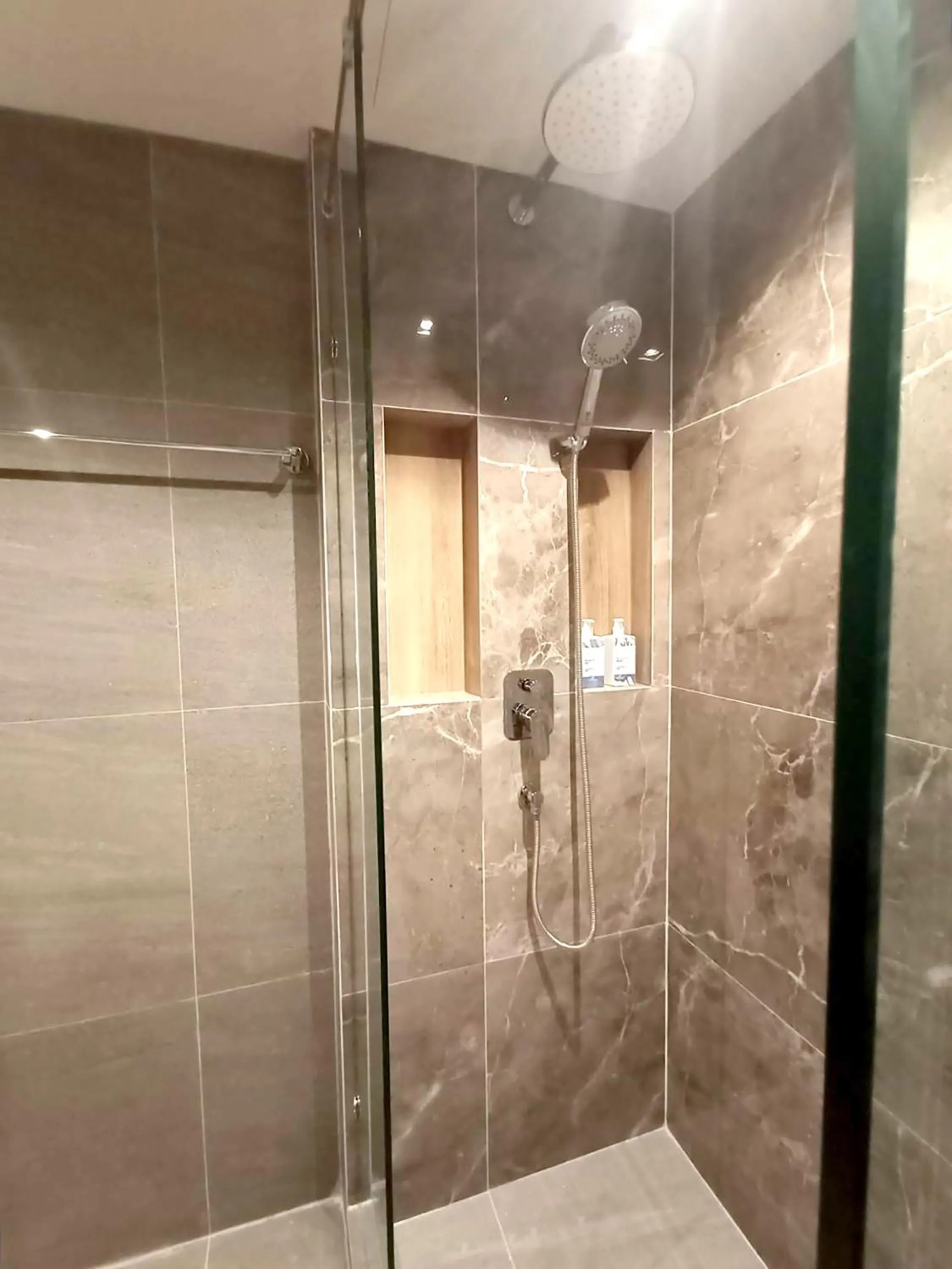 Bathroom in The 9 Residence Hotel