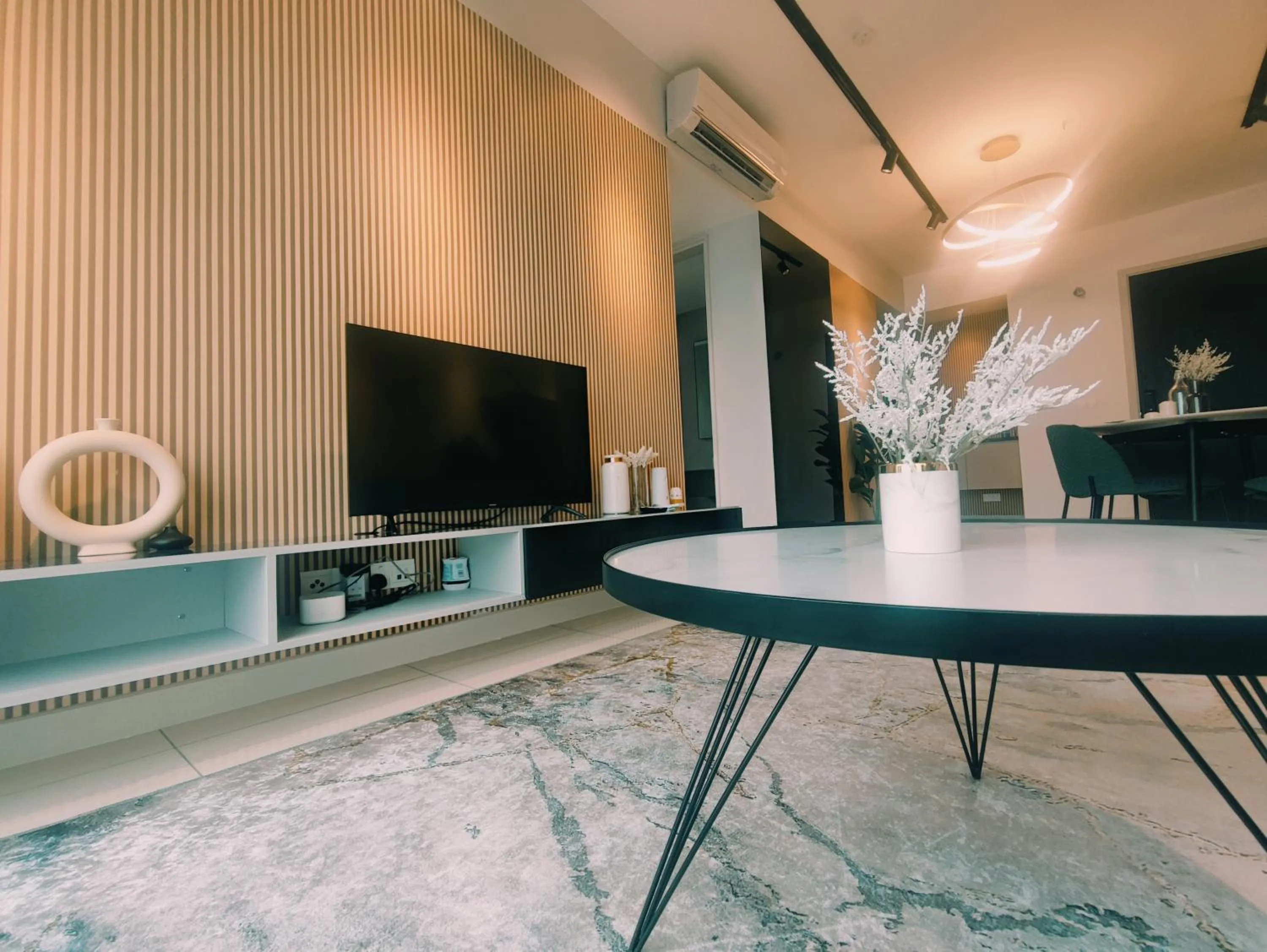 Communal lounge/ TV room in Stylish KL Suite, KLCC View, Next to LRT, Datum Jelatek By Atlantis Management