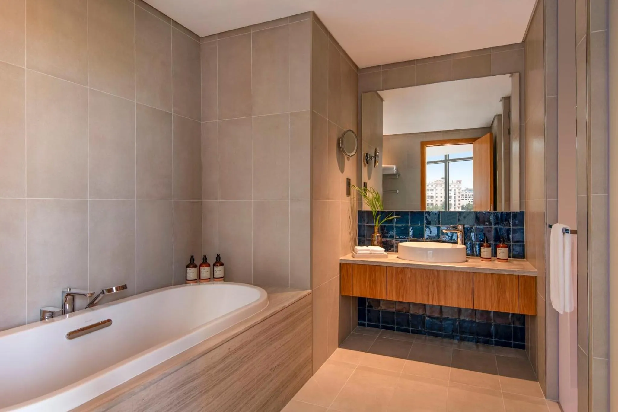 Bathroom in Abesq Doha Hotel and Residences, an IHG Hotel