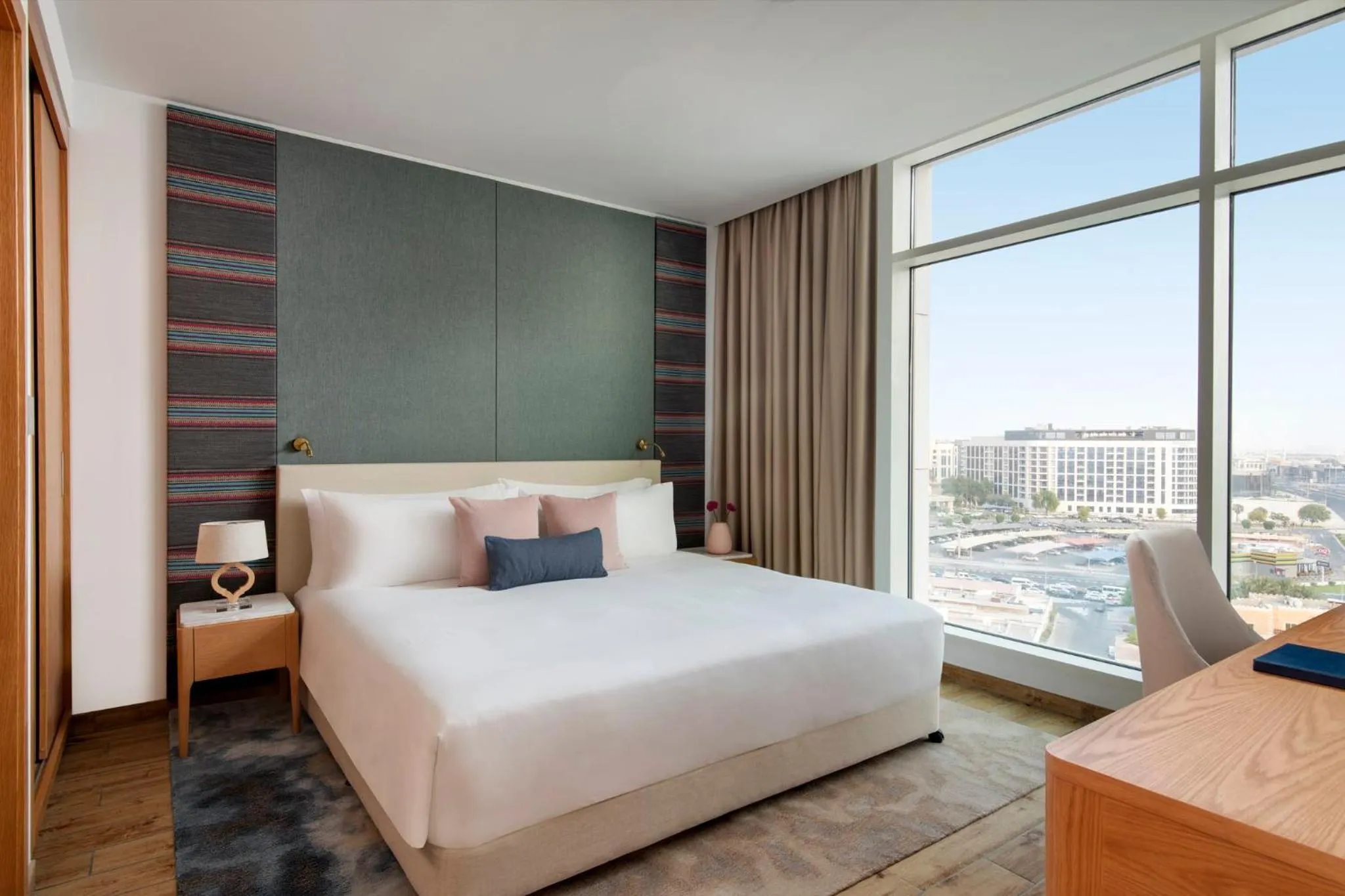 Photo of the whole room, Bed in Abesq Doha Hotel and Residences, an IHG Hotel