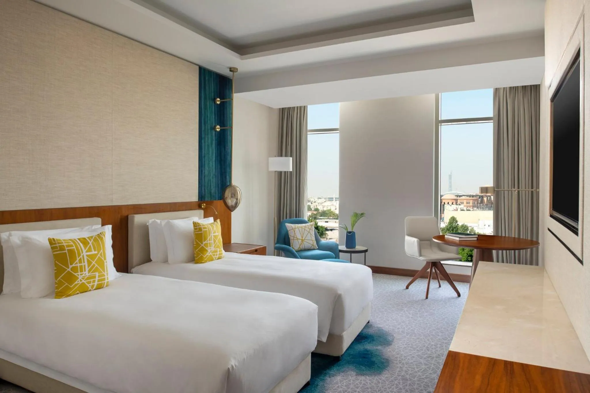 Photo of the whole room, Bed in Abesq Doha Hotel and Residences, an IHG Hotel