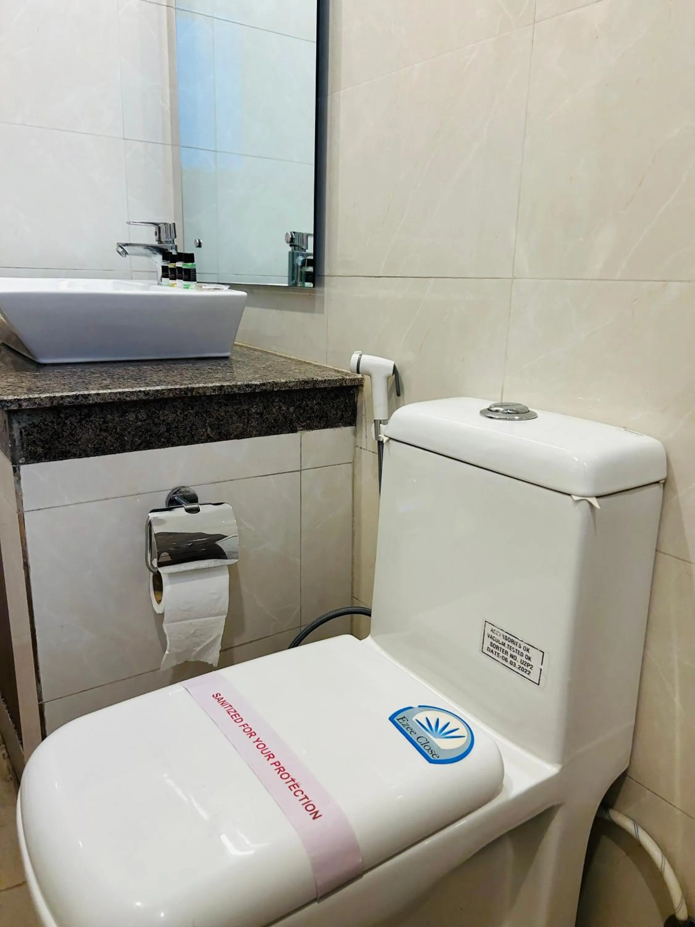 Toilet in Amahi Inn I Signature Towers