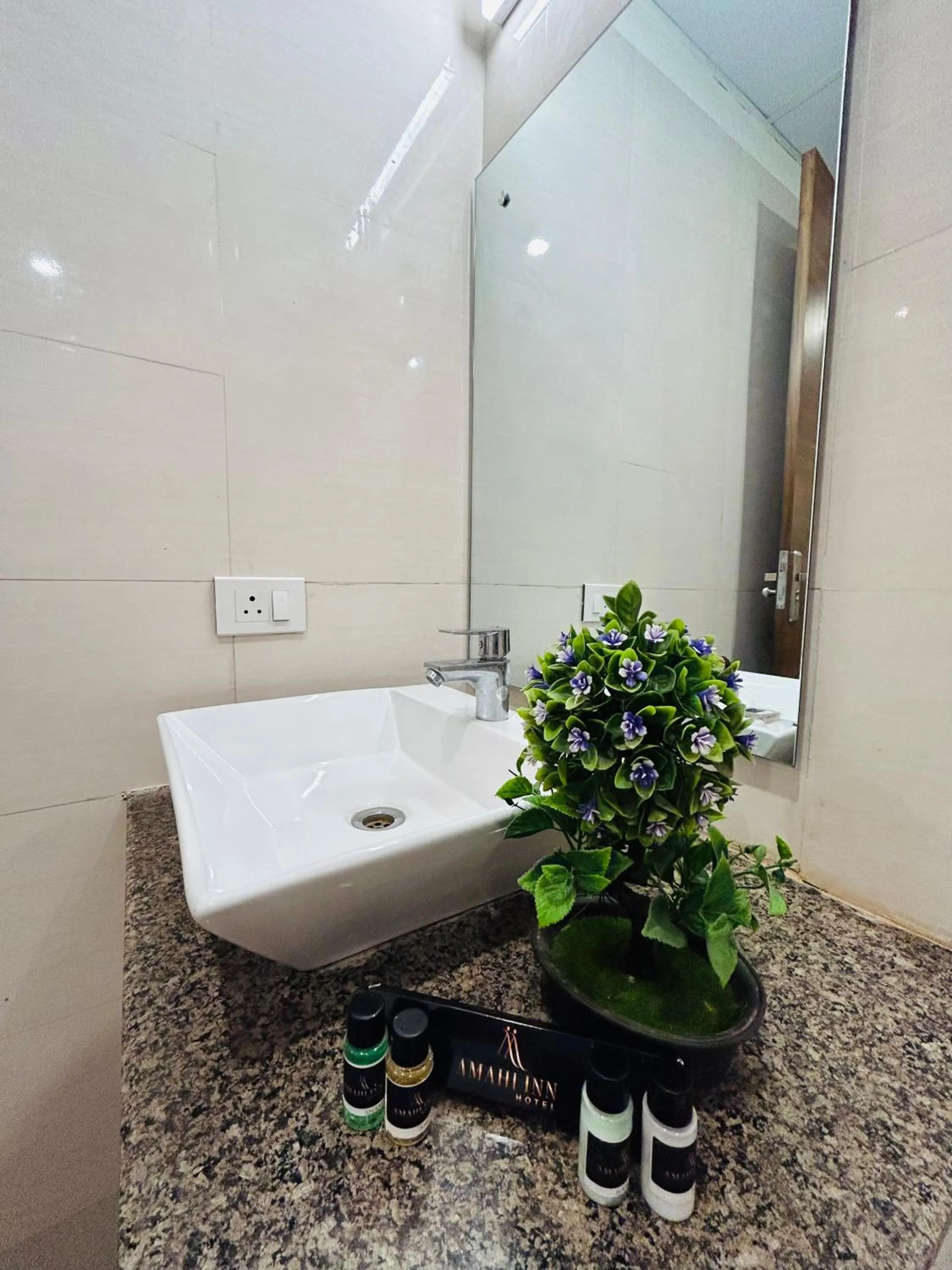 Bathroom in Amahi Inn I Signature Towers