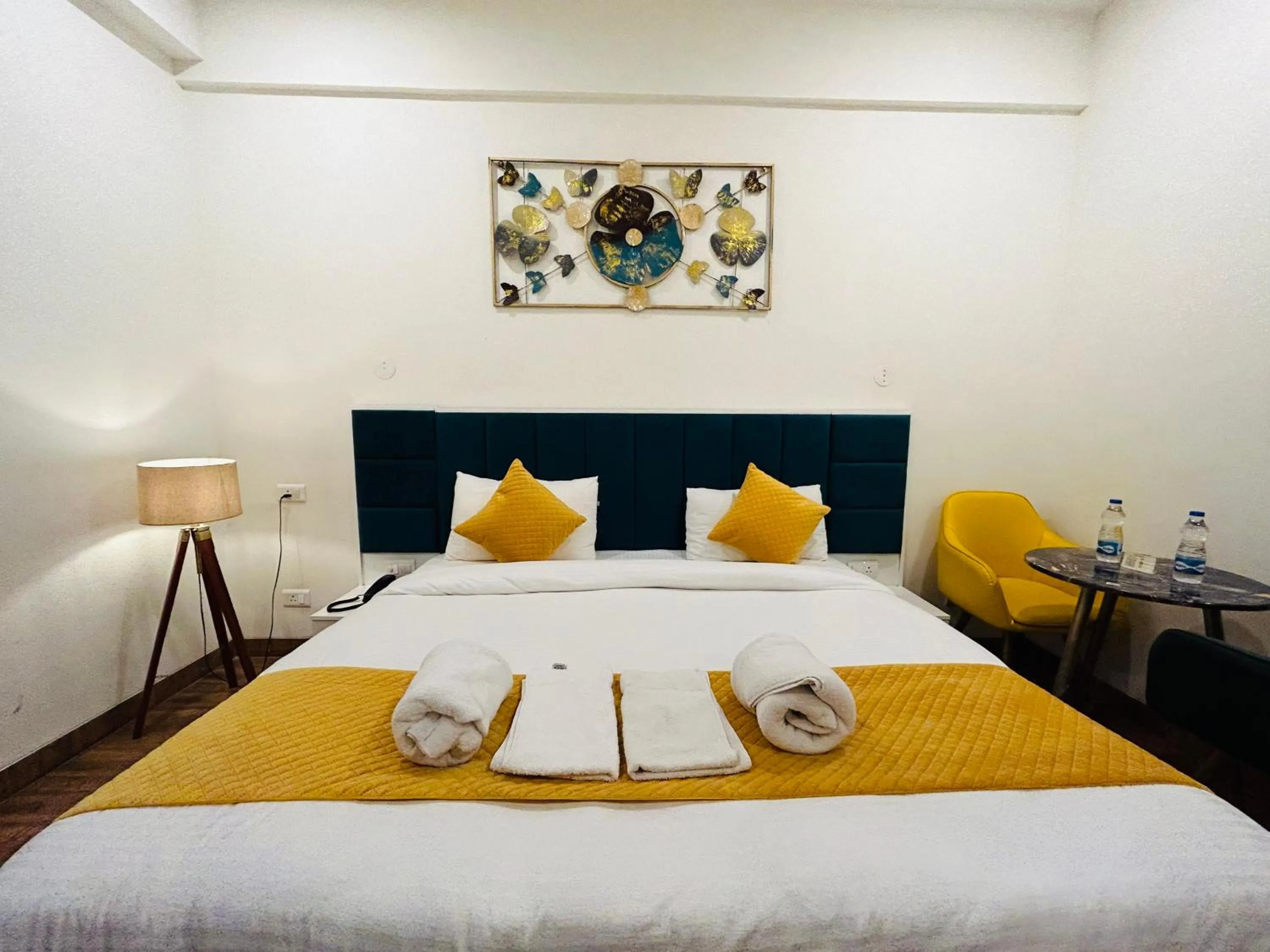 Bed in Amahi Inn I Signature Towers