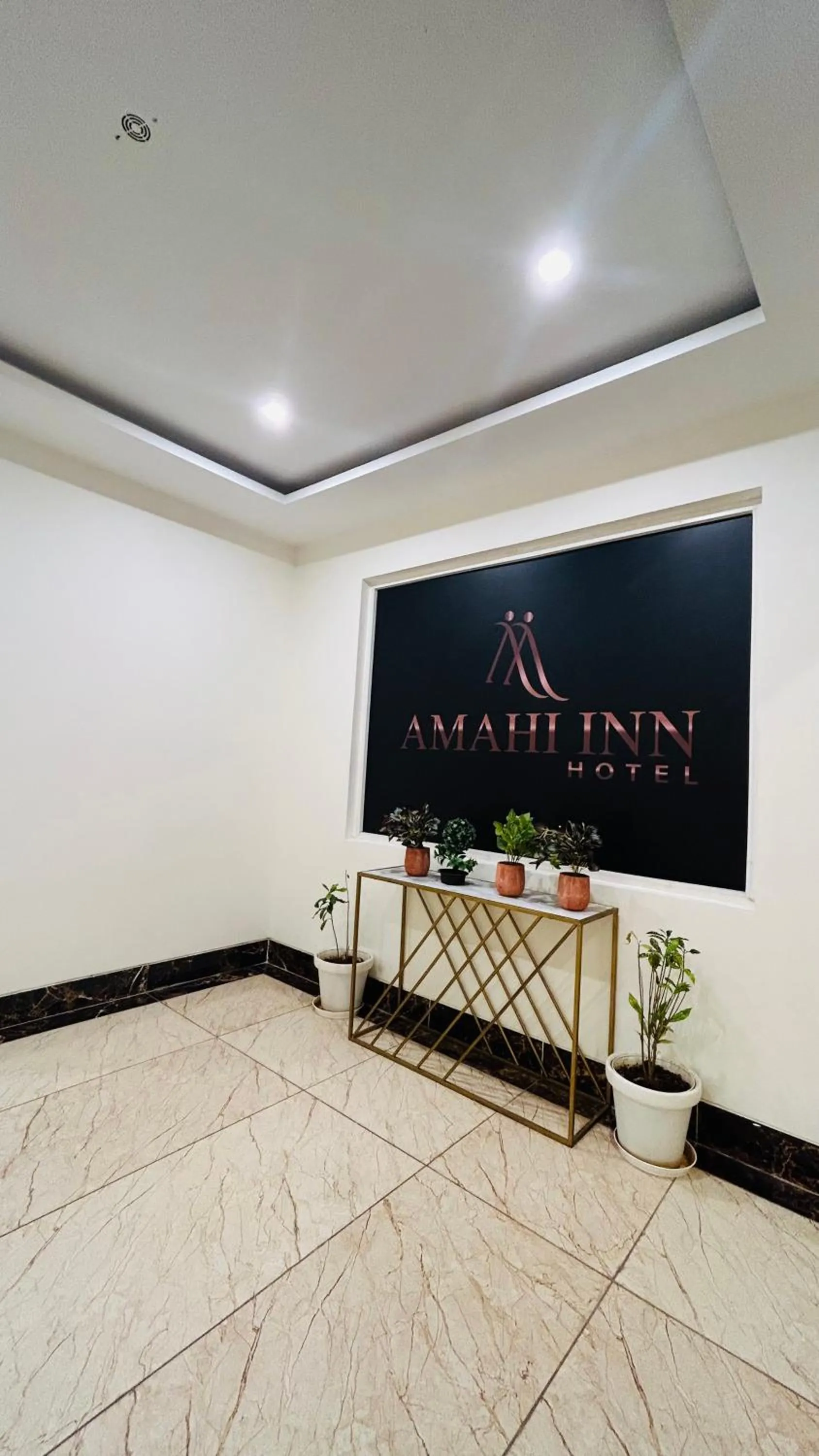 TV and multimedia in Amahi Inn I Signature Towers