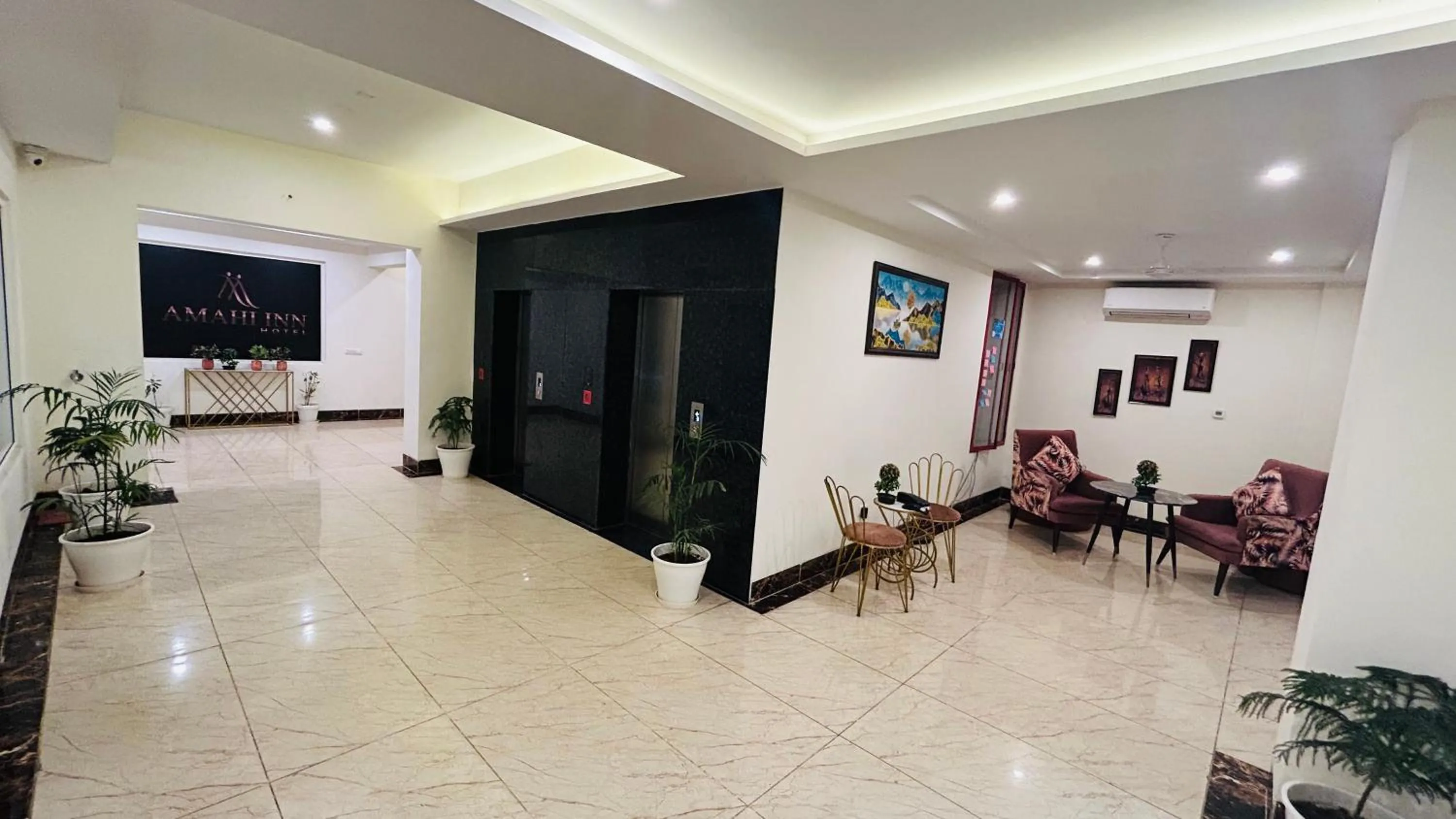 Seating area in Amahi Inn I Signature Towers