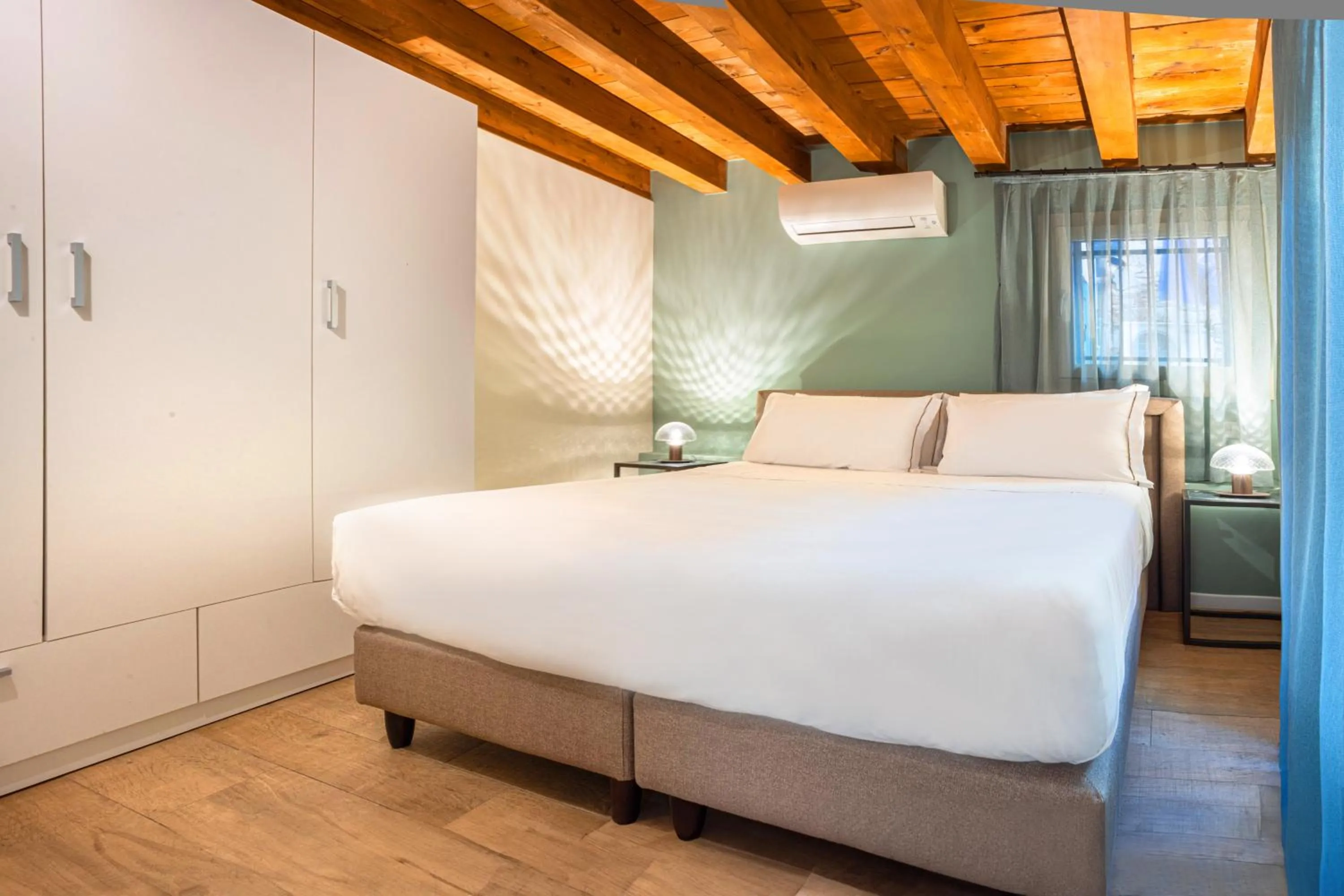 Photo of the whole room, Bed in Palazzina Riello