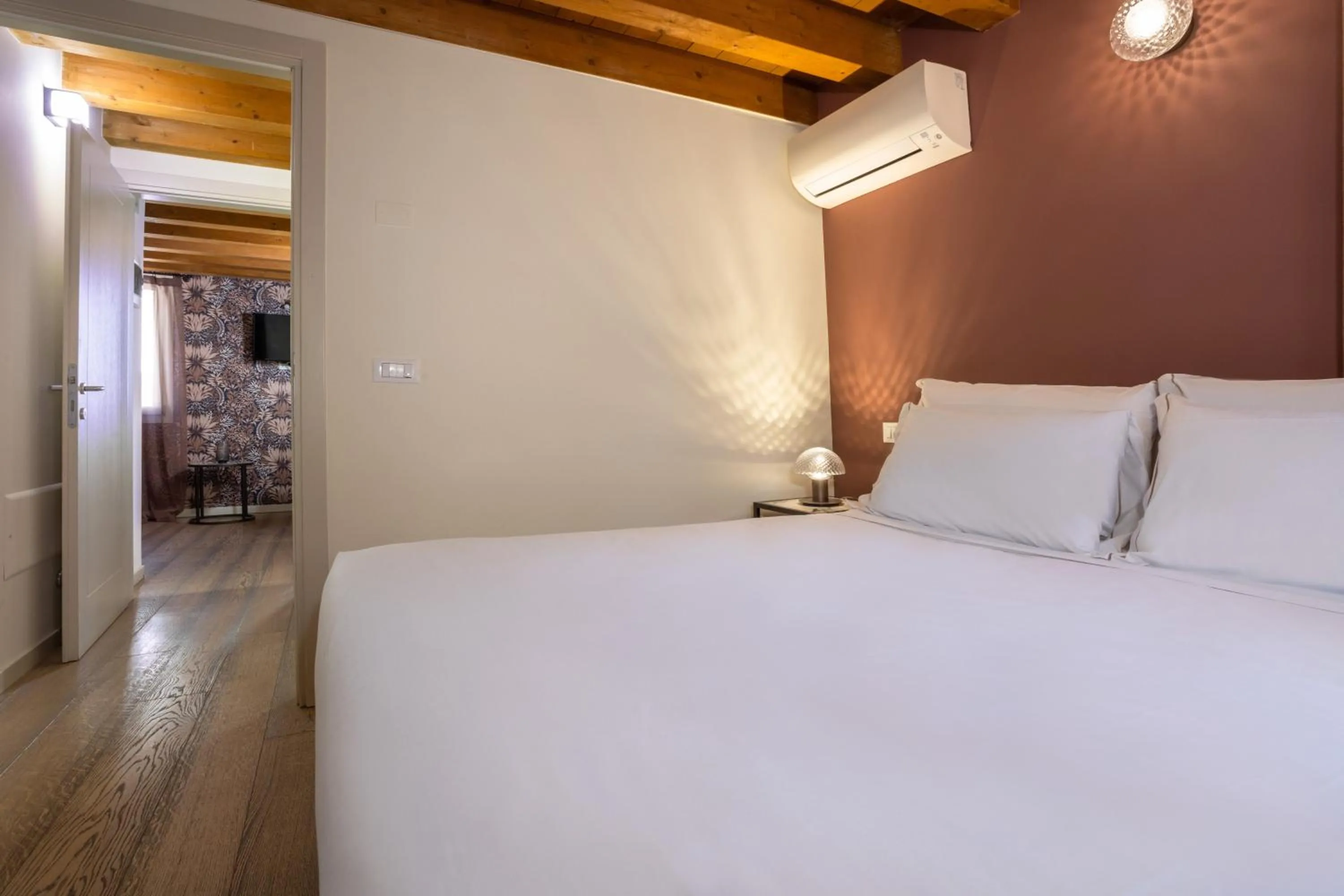 Photo of the whole room, Bed in Palazzina Riello