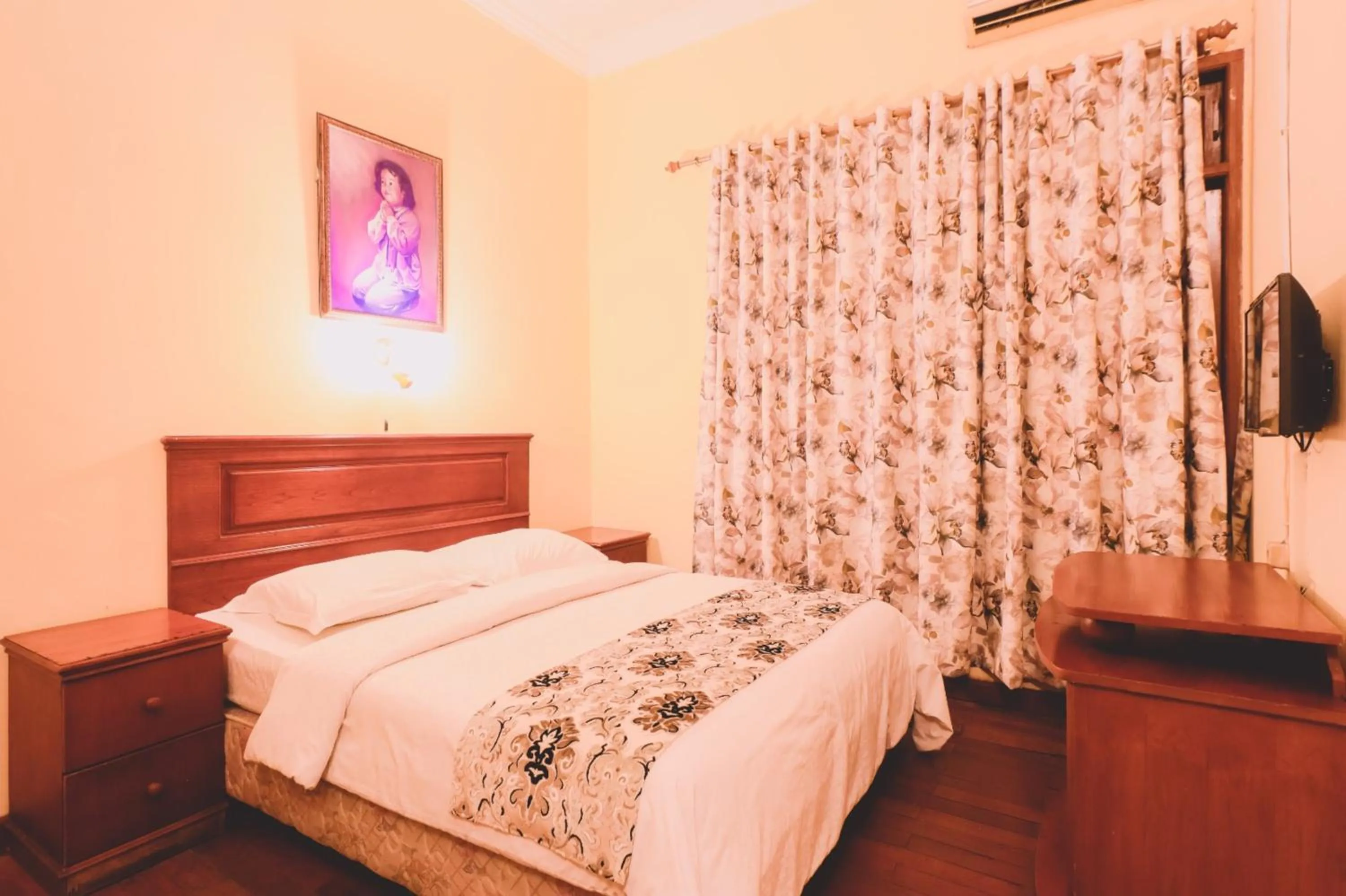 Bed in PIA Hotel Medan