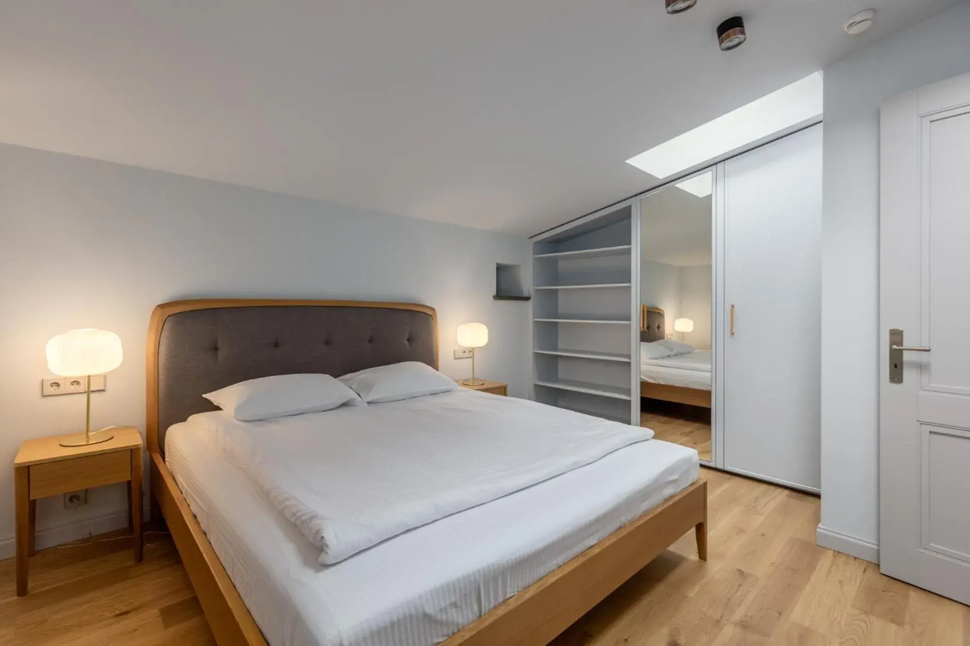 One-Bedroom Mansard in Roze Center Apartments One-Bedroom Mansard in Roze Center Apartments