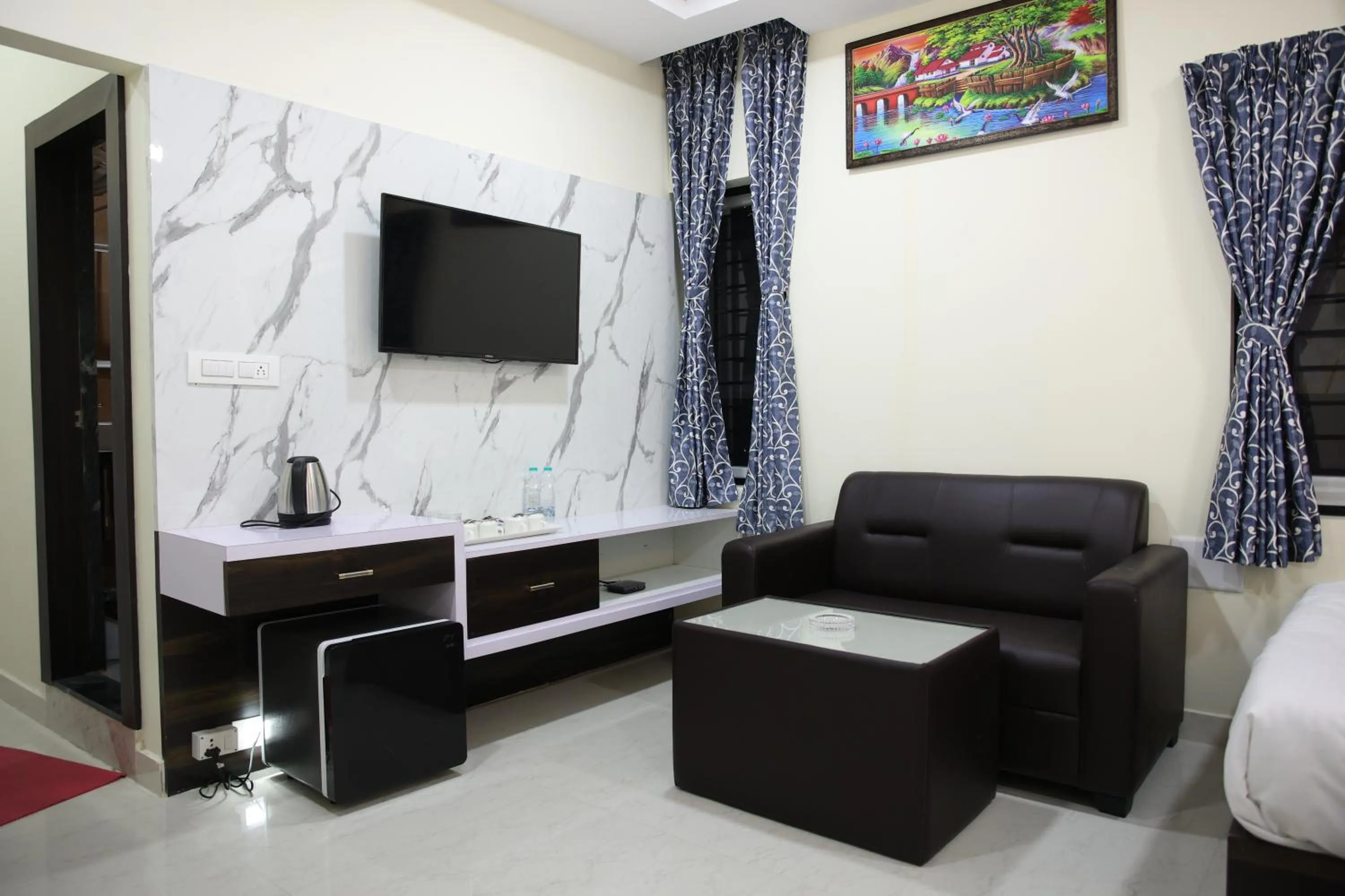 Communal lounge/ TV room in Sunshine International Boarding & Lodging