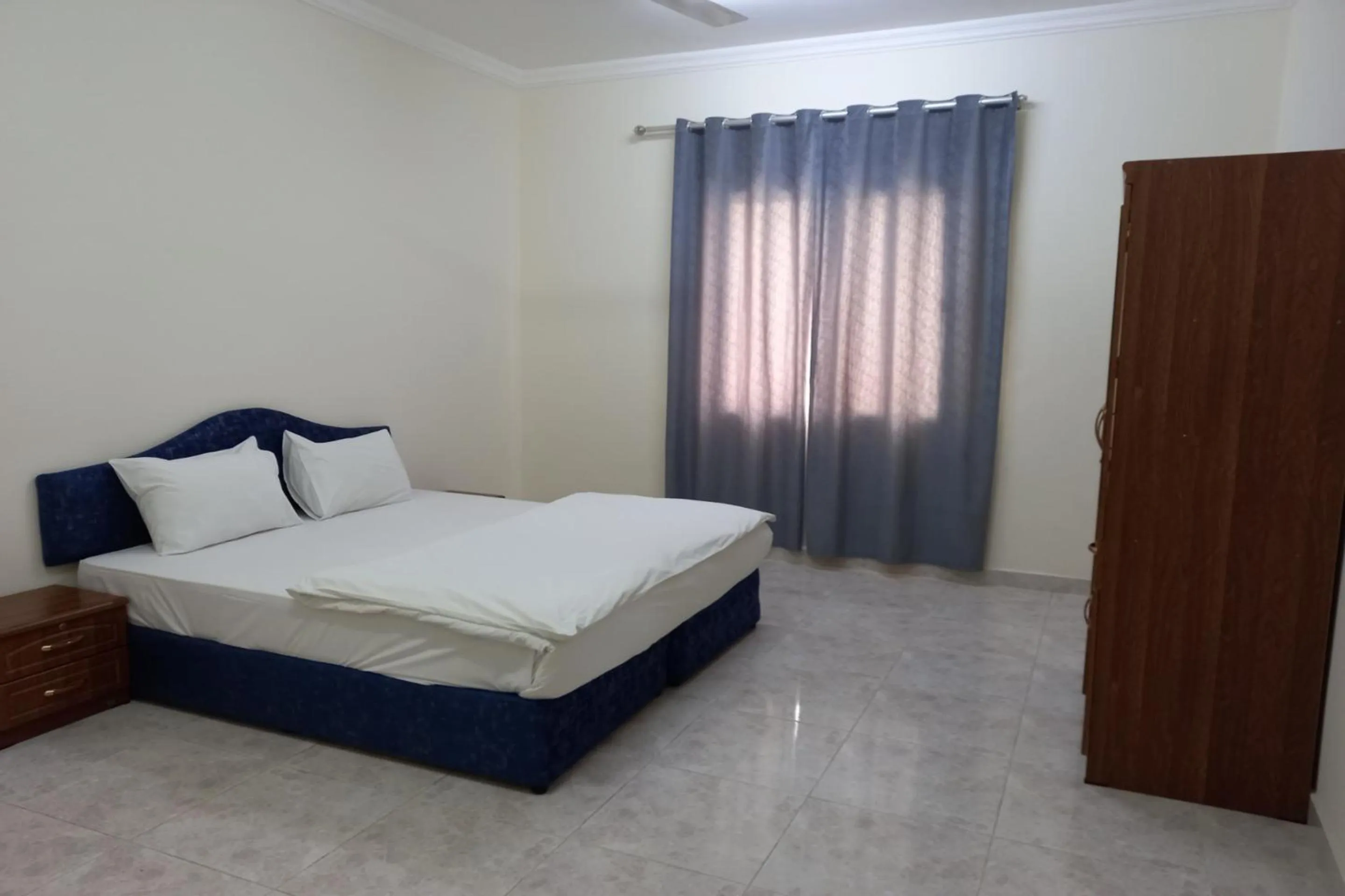 Photo of the whole room, Bed in OYO 147 Babylon Furnished Apartment