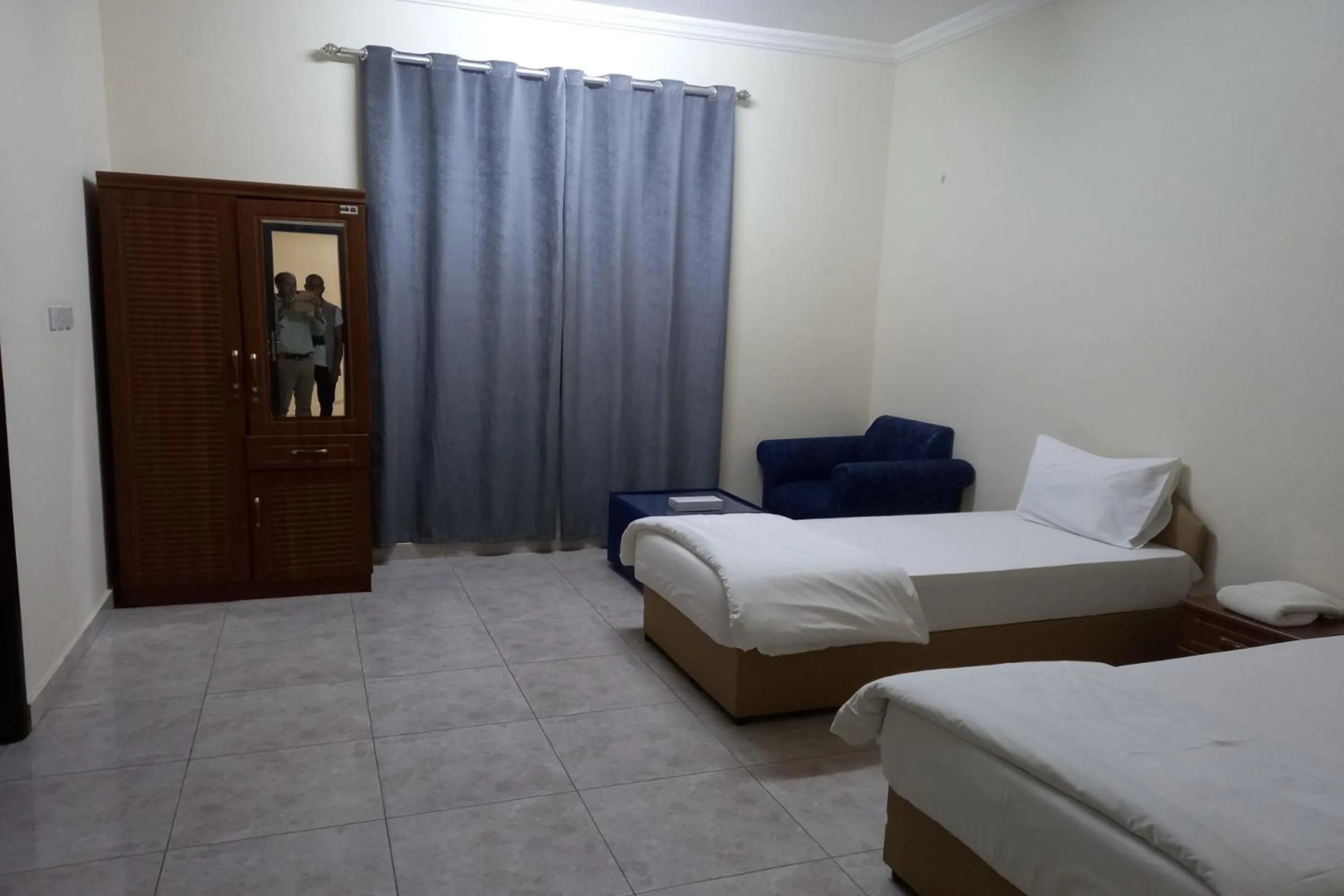 Bedroom, Bed in Super OYO 147 Babylon Furnished Apartment