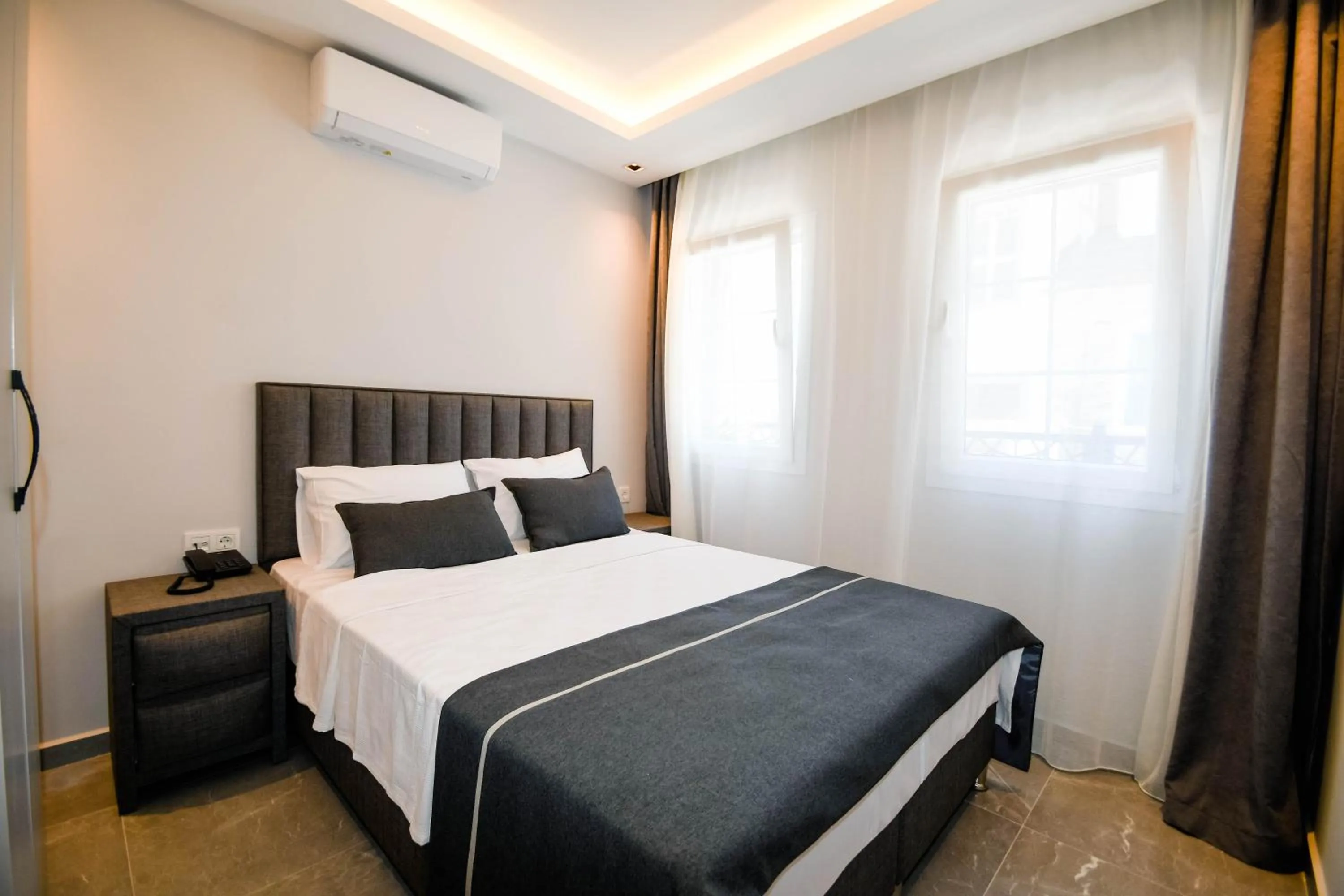 Bed in Swan Boutique Hotel