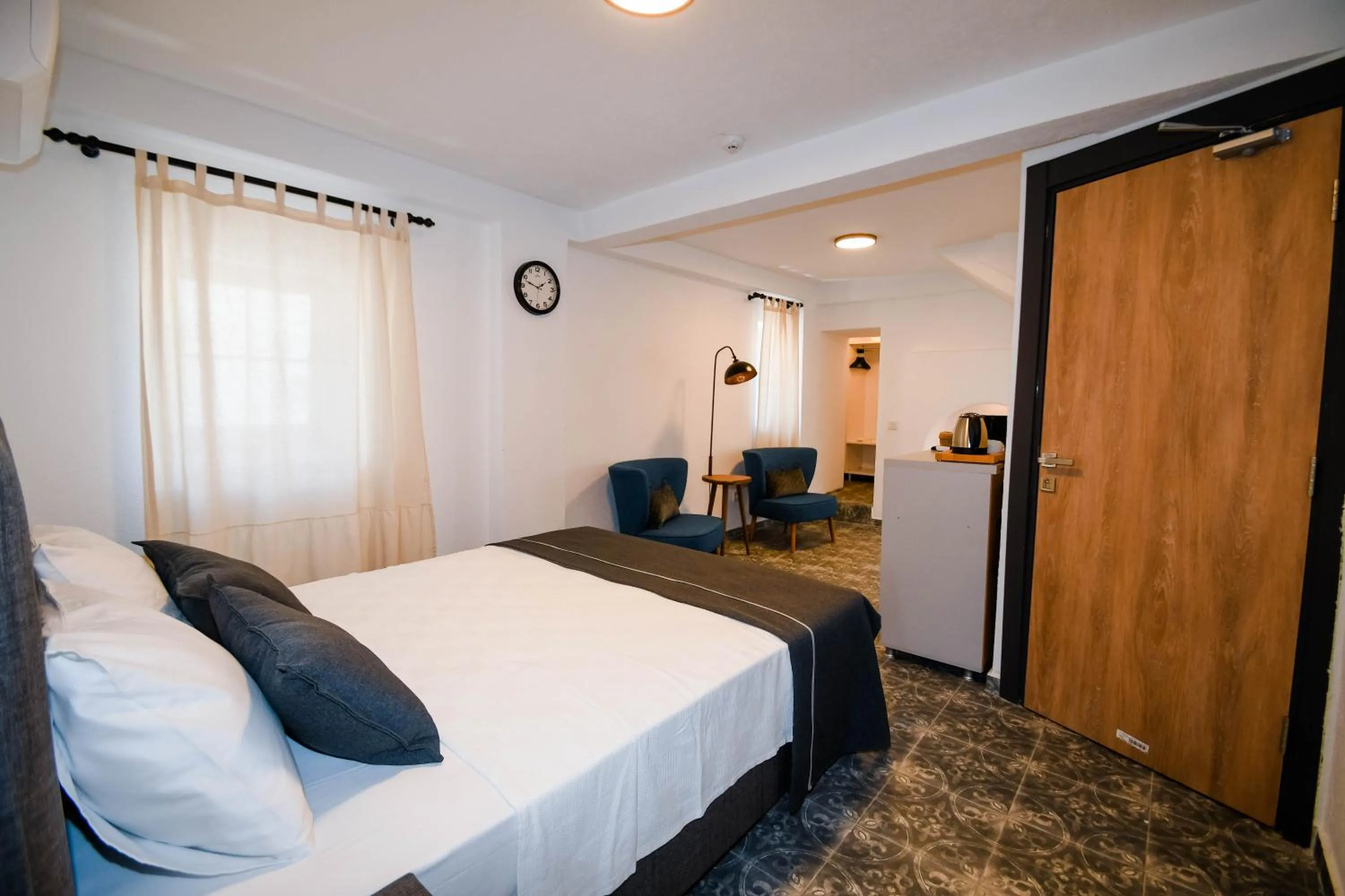 Bed in Swan Boutique Hotel