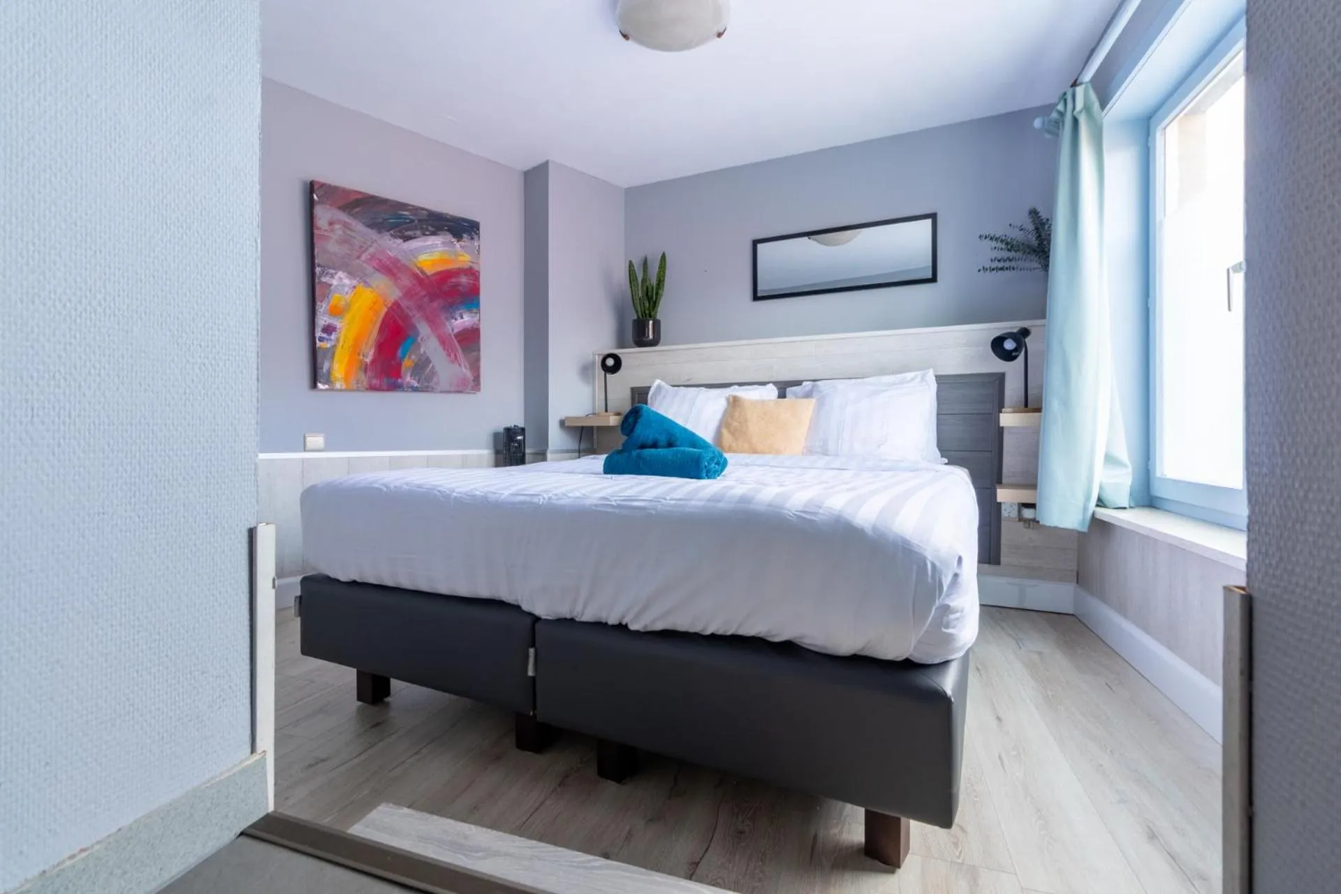 Bed in Hotel Entree - Canal View Bruges