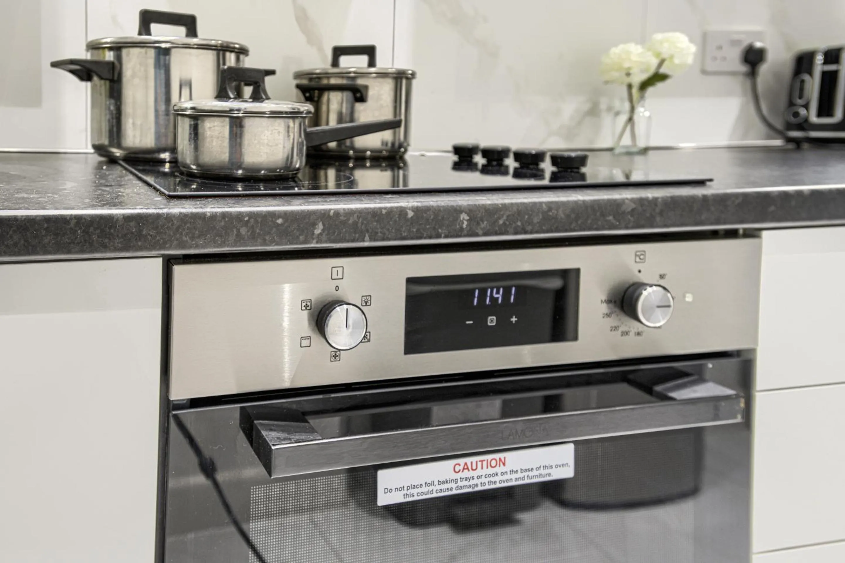 Kitchen or kitchenette in The Finsbury Deluxe Apartments