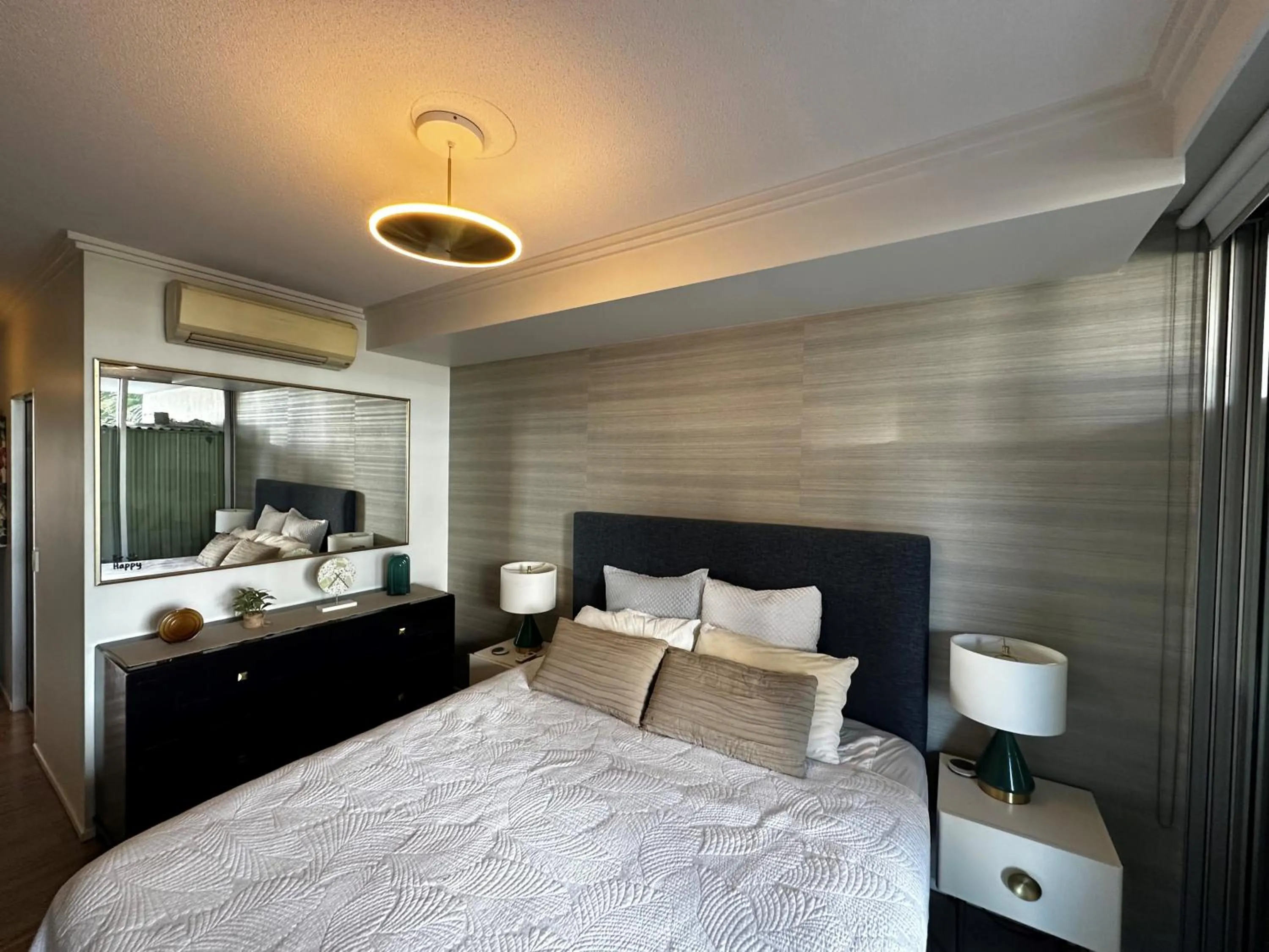 Bed in Story Apartments